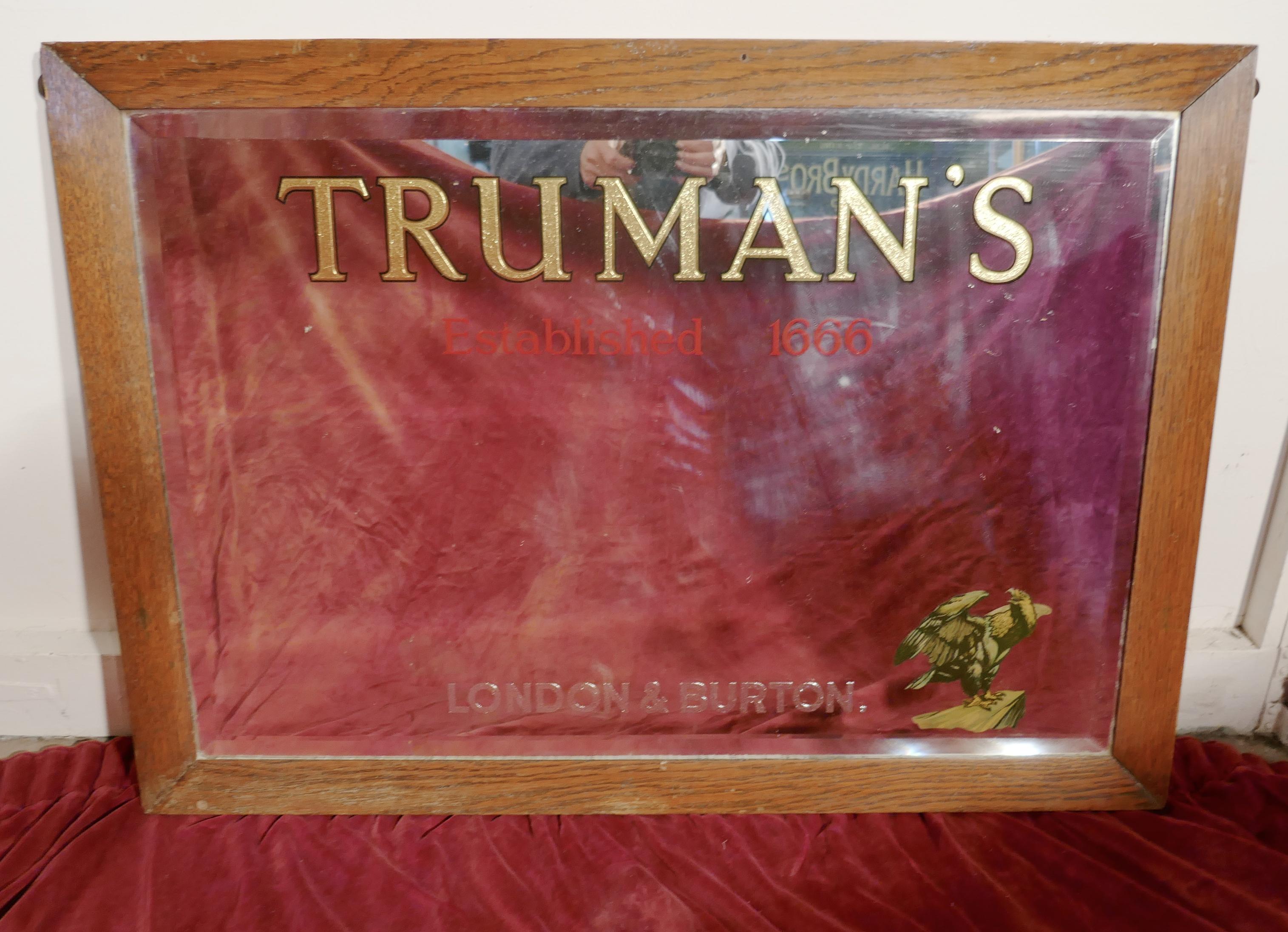 A TRUMAN’S beer advertising mirror, pub mirror for Truman’s.

This is good pictorial advertising mirror, advertising Truman's, established 1666, this is engraved and painted on the reverse of the glass

The mirror has the Eagle logo in the
