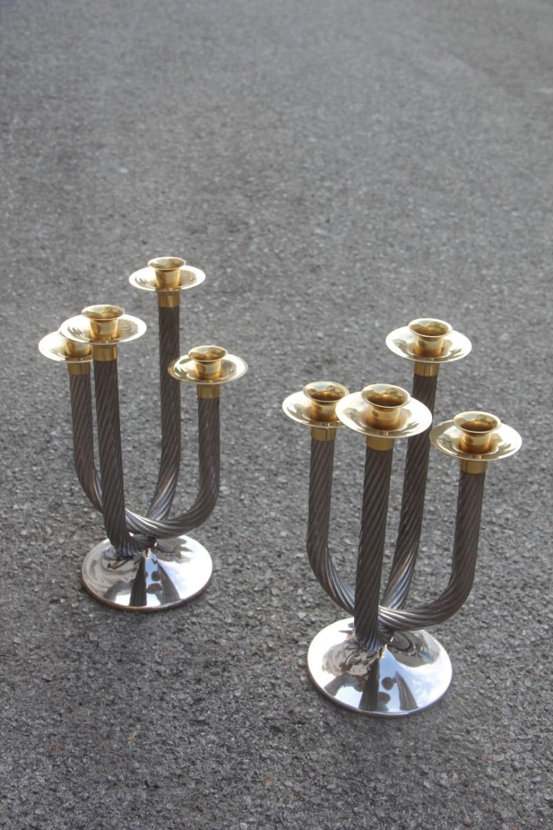 Pair of 1970 candelabra in silver and gold spiral metal.