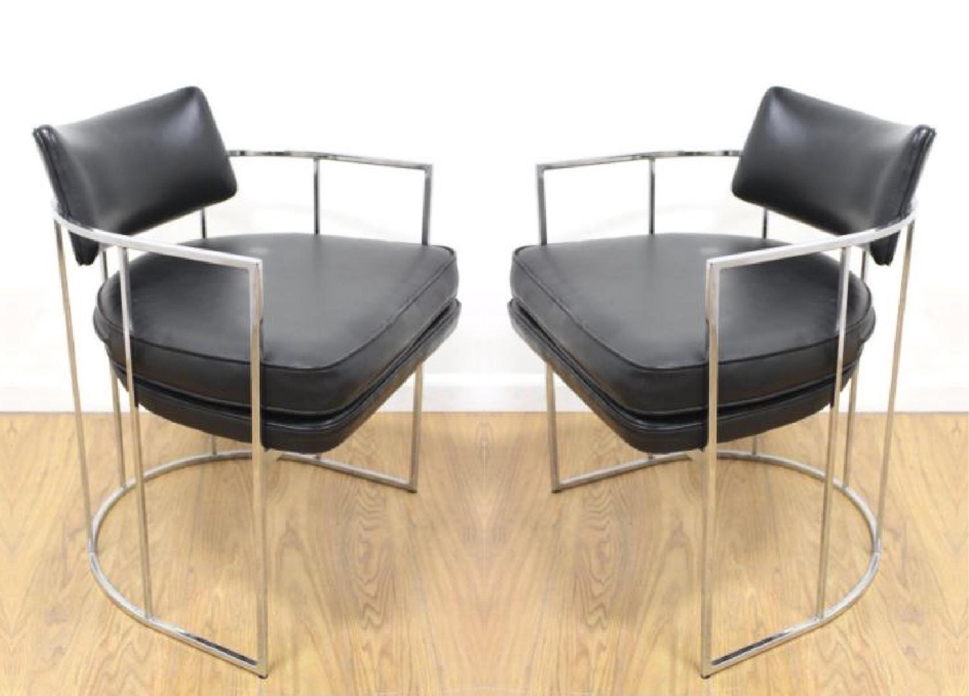 Four chrome Milo Baughman dining chairs for Thayer Coggin. Feature unique ellipse chrome frames with thick padded seating and a tufted floating backrest. Newly upholstered in black.