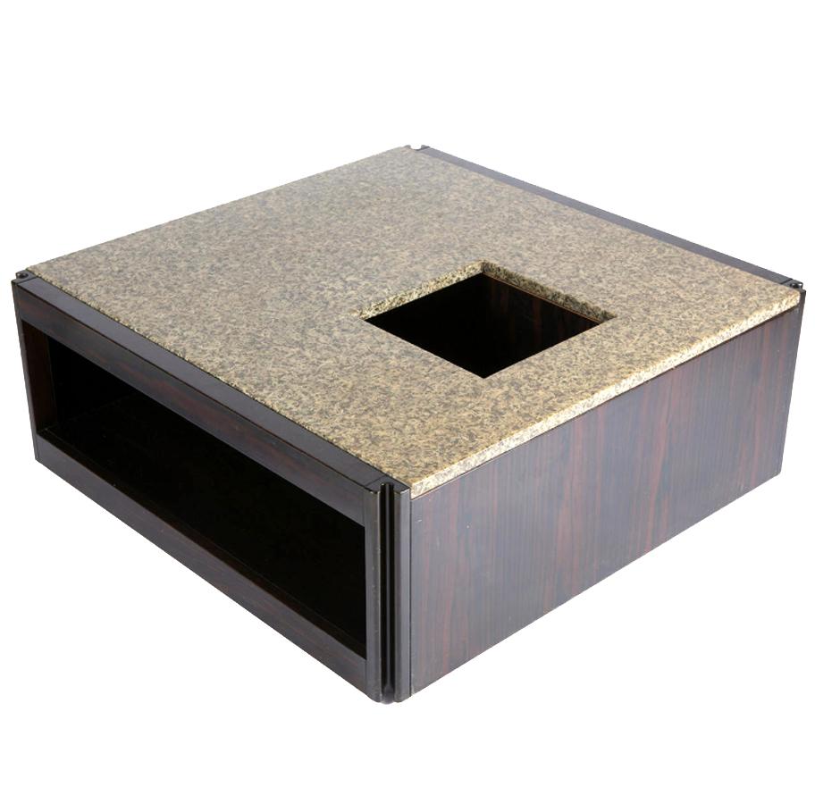Square Coffee Table
Angelo Mangiarotti
Molteni
Italy, 1960

Wood base and marble top with two cubby hole openings and a central plant holder. The piece has all edges designed with an ergonomic shape and has wheels to help to move.