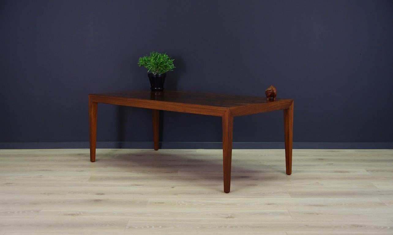 Vintage coffee table from the 1960s-1970s. Minimalist form designed by a leading Danish designer Severin Hansen, from manufactory Haslev Møbelfabrik. Form veneered with rosewood. Original legs in rosewood. Coffee table in good condition (small