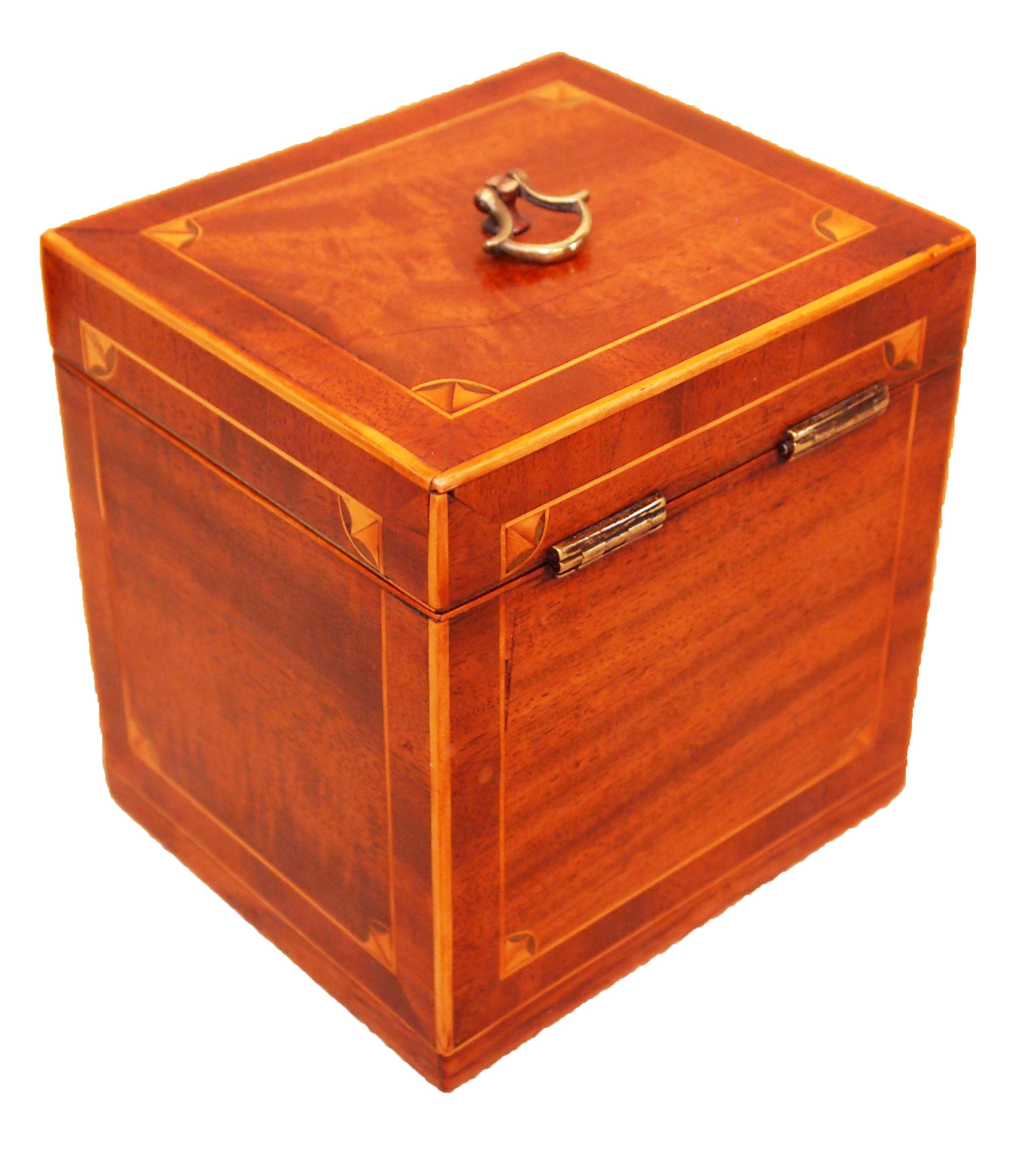 An attractive George III period mahogany oblong.
Tea caddy having inlaid decoration.
