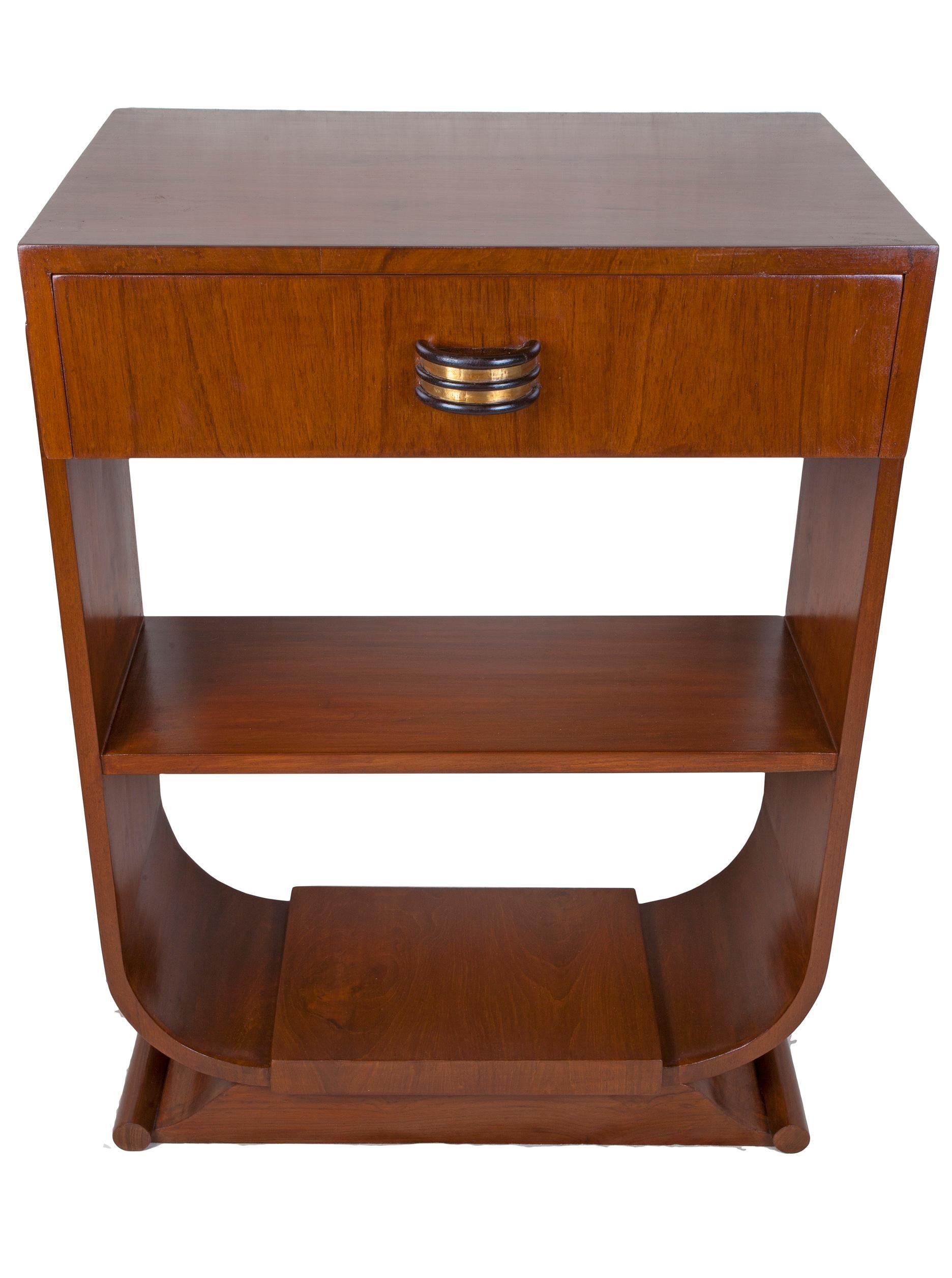 Pair of Mid-Century Modern teak side tables with rosewood and brass drawer pulls, u-shaped sides with middle shelf. Rolled end base. Perfect height for bedside or sofa tables. Refinished. Measures: Distance between shelves is 10