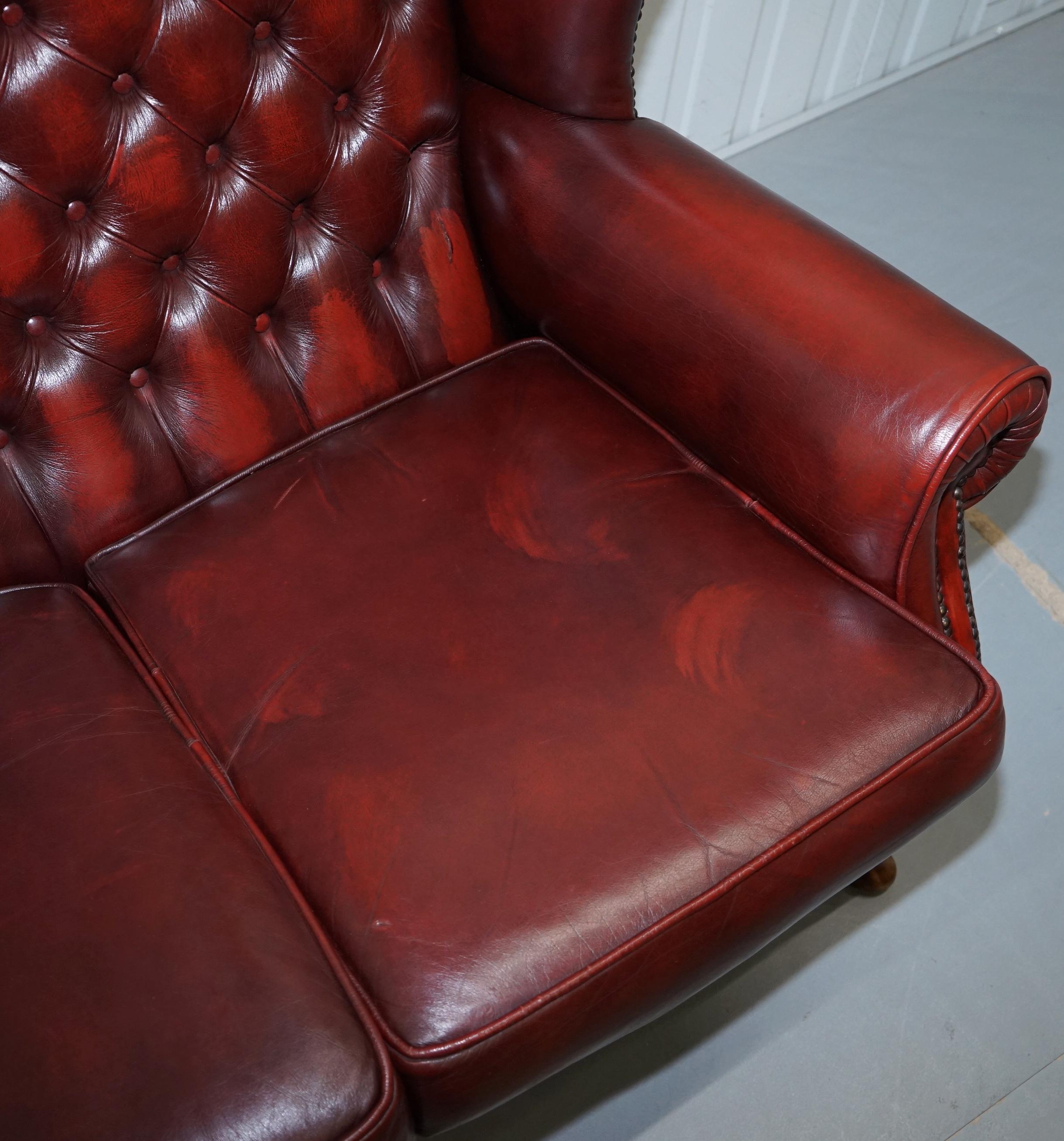 20th Century Vintage Chesterfield Oxblood Leather Two-Seat Wingback Leather Sofa Seat Settee