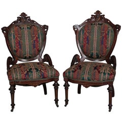 Antique Pair of Renaissance Revival Carved Walnut Upholstered Parlor Side Chairs
