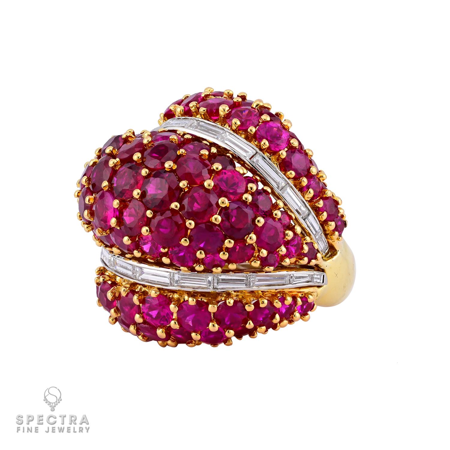 This stunning ring features vibrant rubies totaling 15.26 carats, each stone exuding a deep, rich red that captures the essence of timeless elegance. Complementing the rubies are brilliant baguette-cut diamonds, weighing 2.15 carats, with