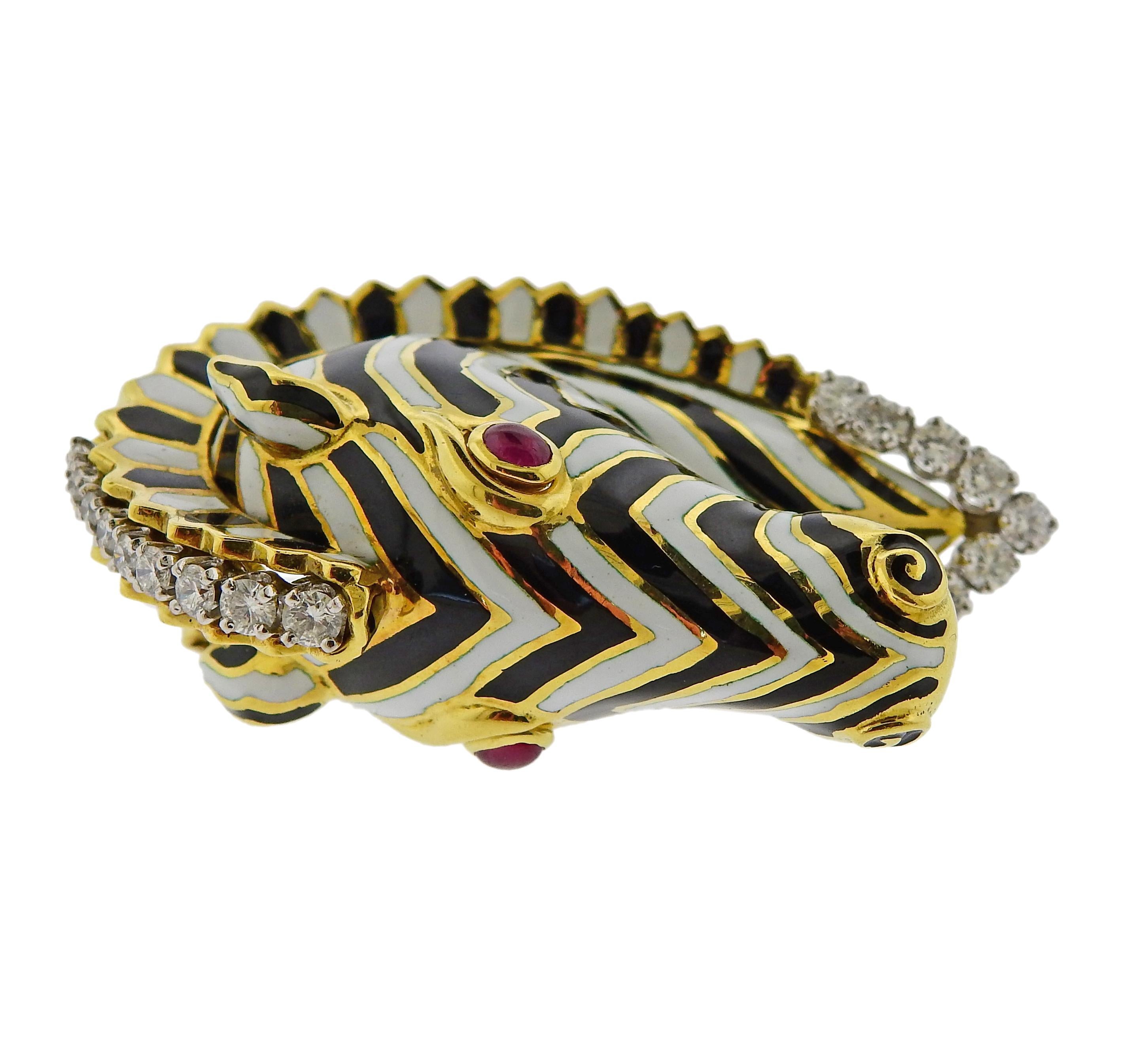 18k gold and platinum zebra brooch by David Webb, set with ruby cabochon eyes and approx. 1.00ctw in diamonds. The brooch measures 52mm x 33mm . marked David Webb, 18k, 900 PT. Weighs 45.7 grams. 

SKU#PB-03023
