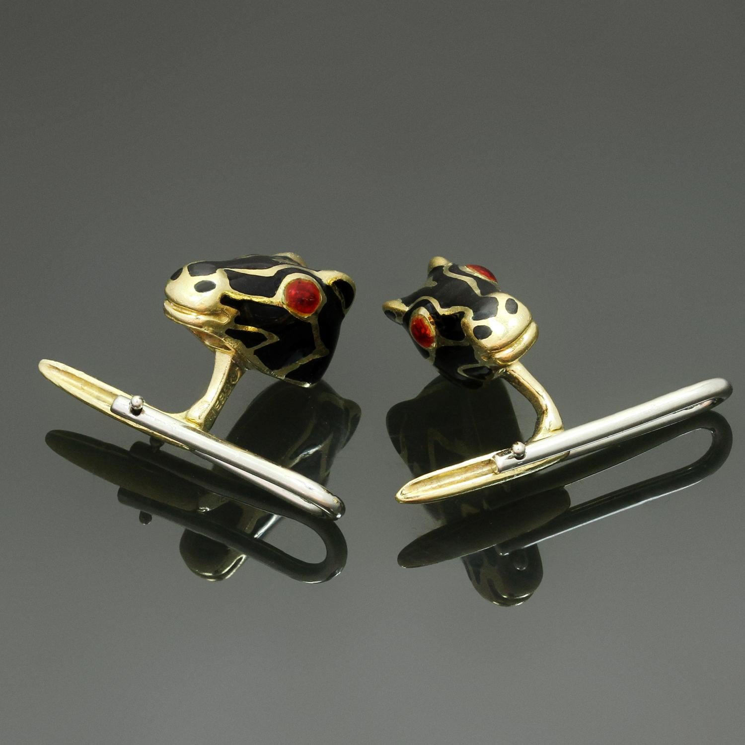 These gorgeous David Webb shirt studs feature an elegant horse head design crafted in black enamel and 18k yellow gold and accented with red ruby eyes. Made in United States circa 1980s. Measurements: 0.23