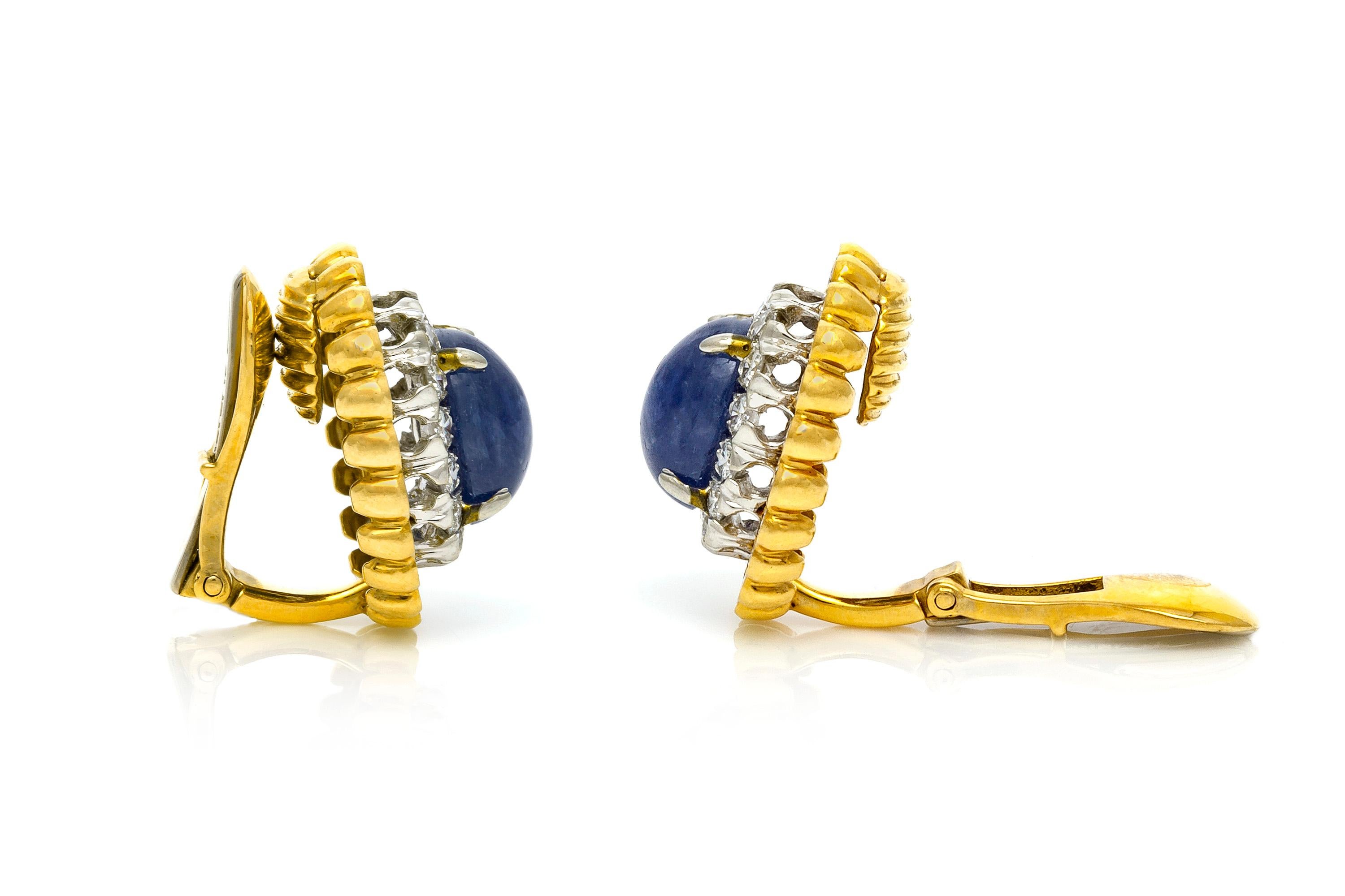 Finely crafted in 18k yellow and white gold with two Cabochon Sapphires weighing approximately a total of 10.00 carats.
The earrings feature round brilliant cut diamonds weighing approximately a total of 6.00 carats.
Signed by David Webb
Clip-on
