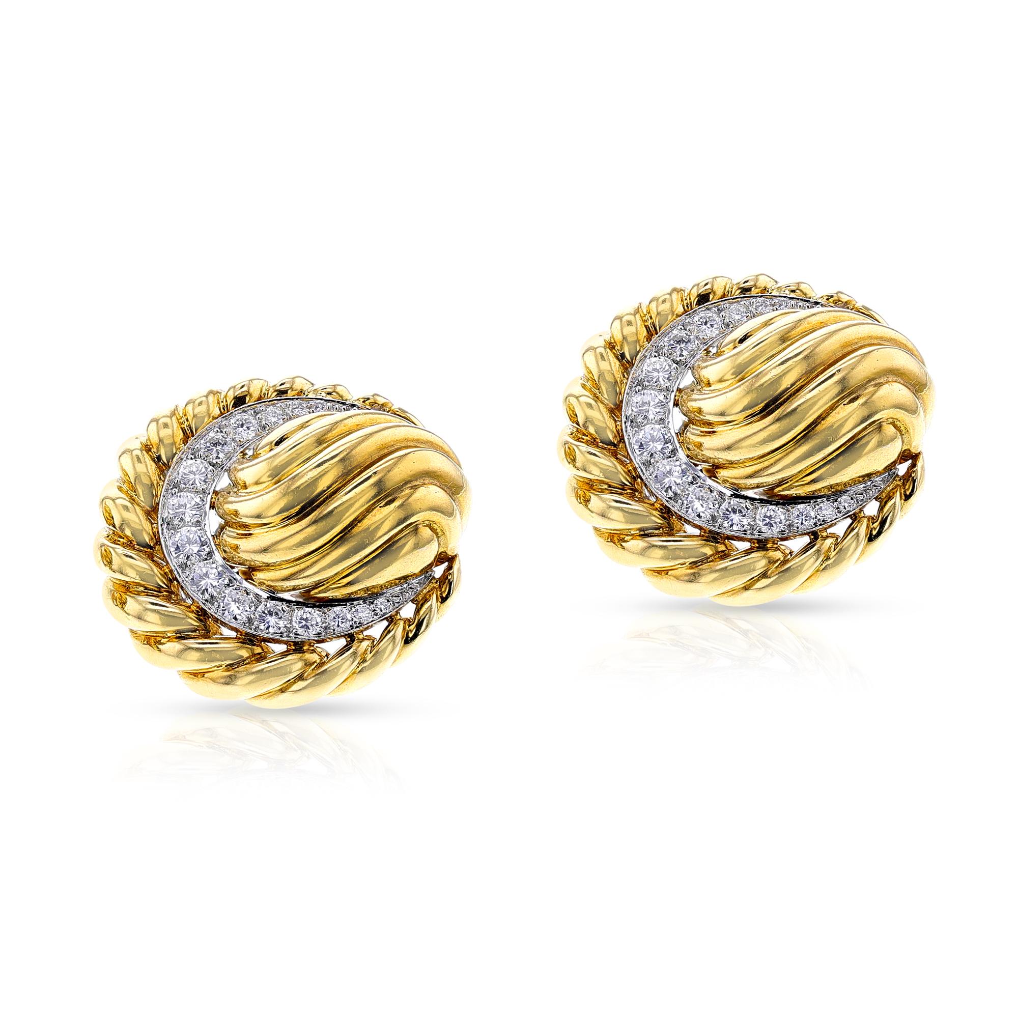 A stunning pair of David Webb Textured Gold and Diamond Clip-on Earrings made in 18k yellow Gold. The total weight of the earring is 37.10 grams. The dimensions are 1.2