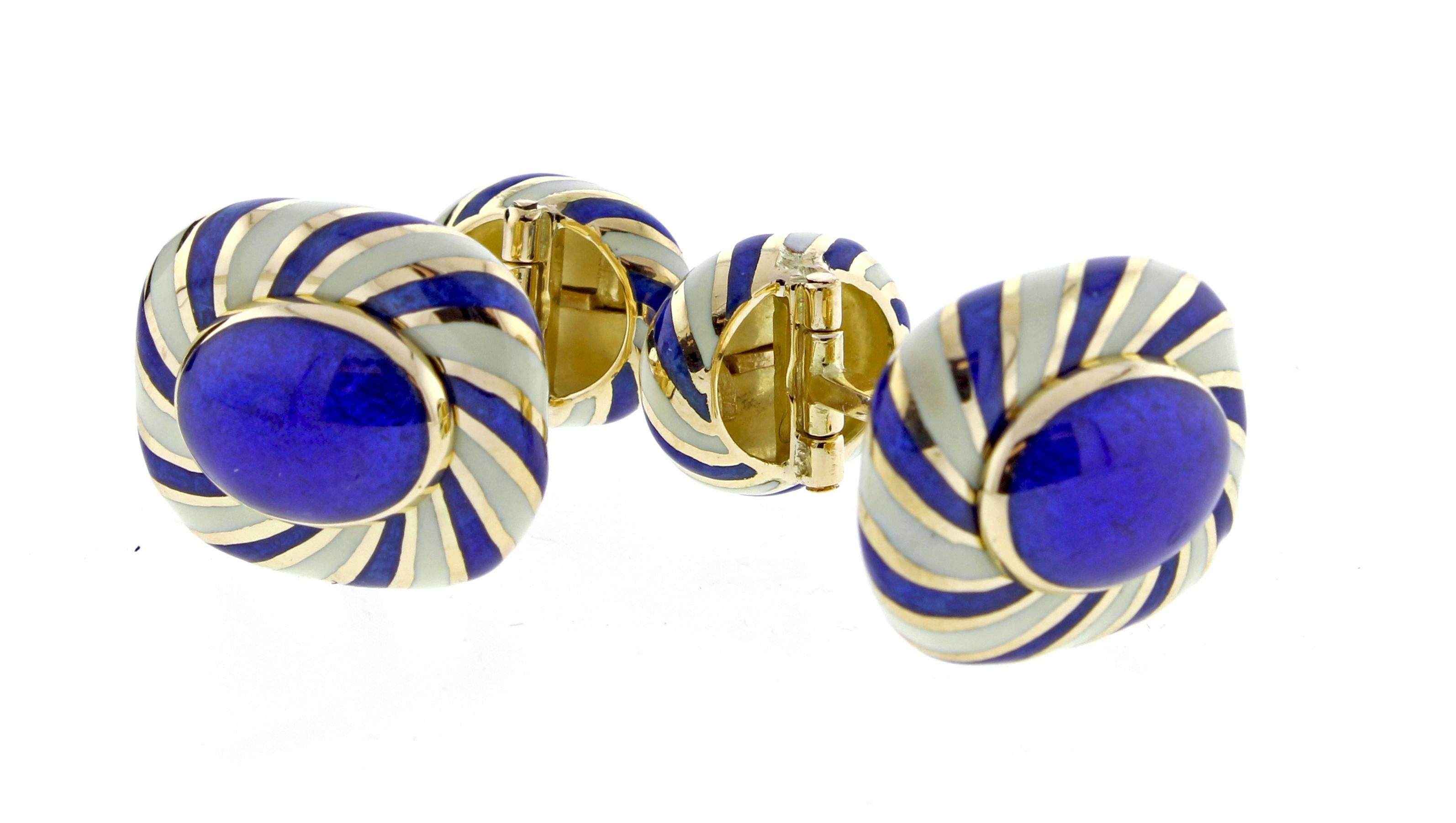 From David Webb, this distinctive pair of turban style cufflinks. The  18 karat cufflinks measure 7.8mm x 5.5mm. Swivel back design for ease of use.

