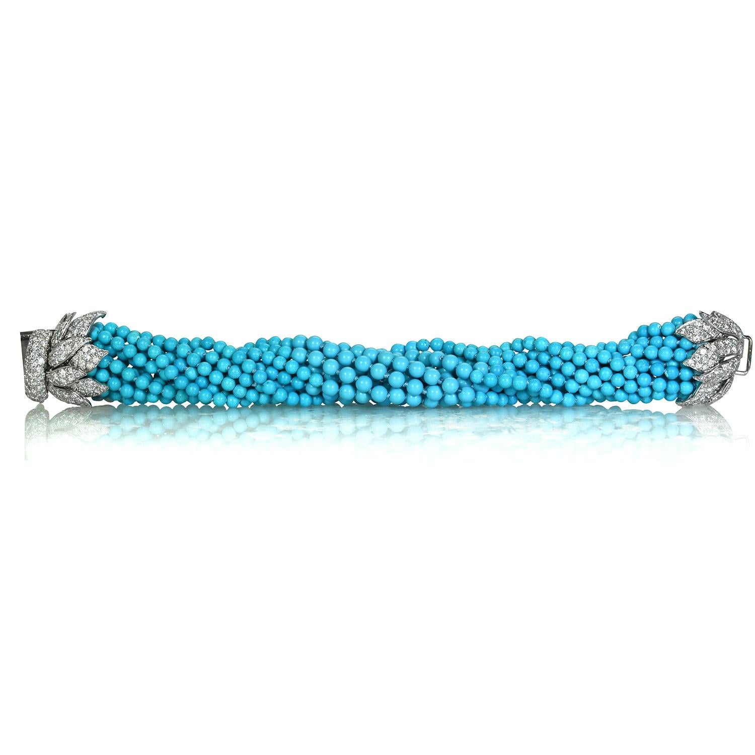 A beautiful turquoise and diamond bracelet by iconic designer David Webb. The bracelet features multi-strand turquoise beads measuring 3.8 to 4.5mm and round brilliant diamonds totaling approximately 6.50 carats set in a platinum clasp. The bracelet