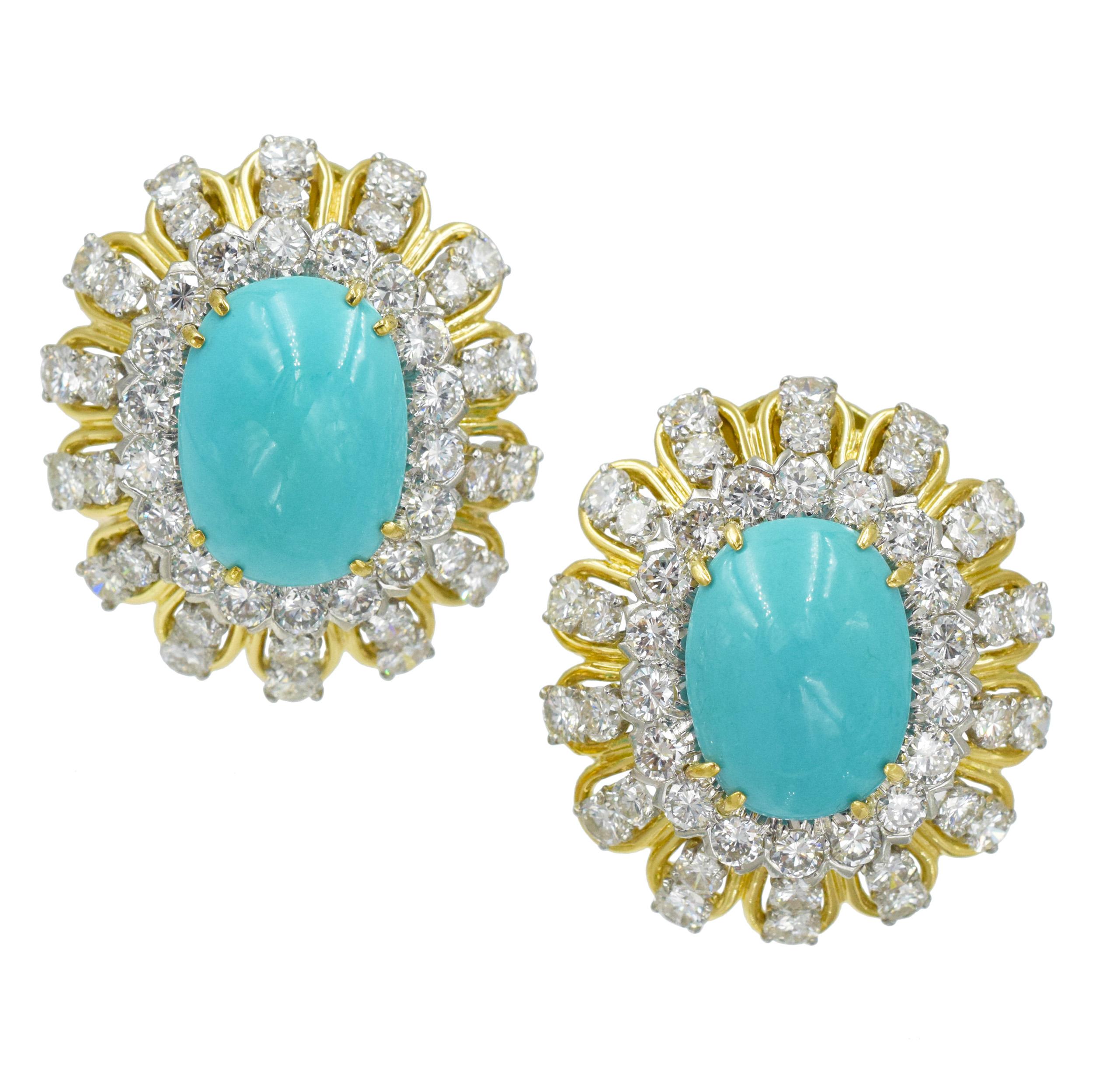 David Webb Turquoise and Diamond Earrings
This stunning pair of earrings has 2 cabochon turquoises flanked by 92 brilliant cut diamonds weighing a
total of approximately 7.90ct. Set in 18k yellow gold and platinum. 
The back of the earrings have an