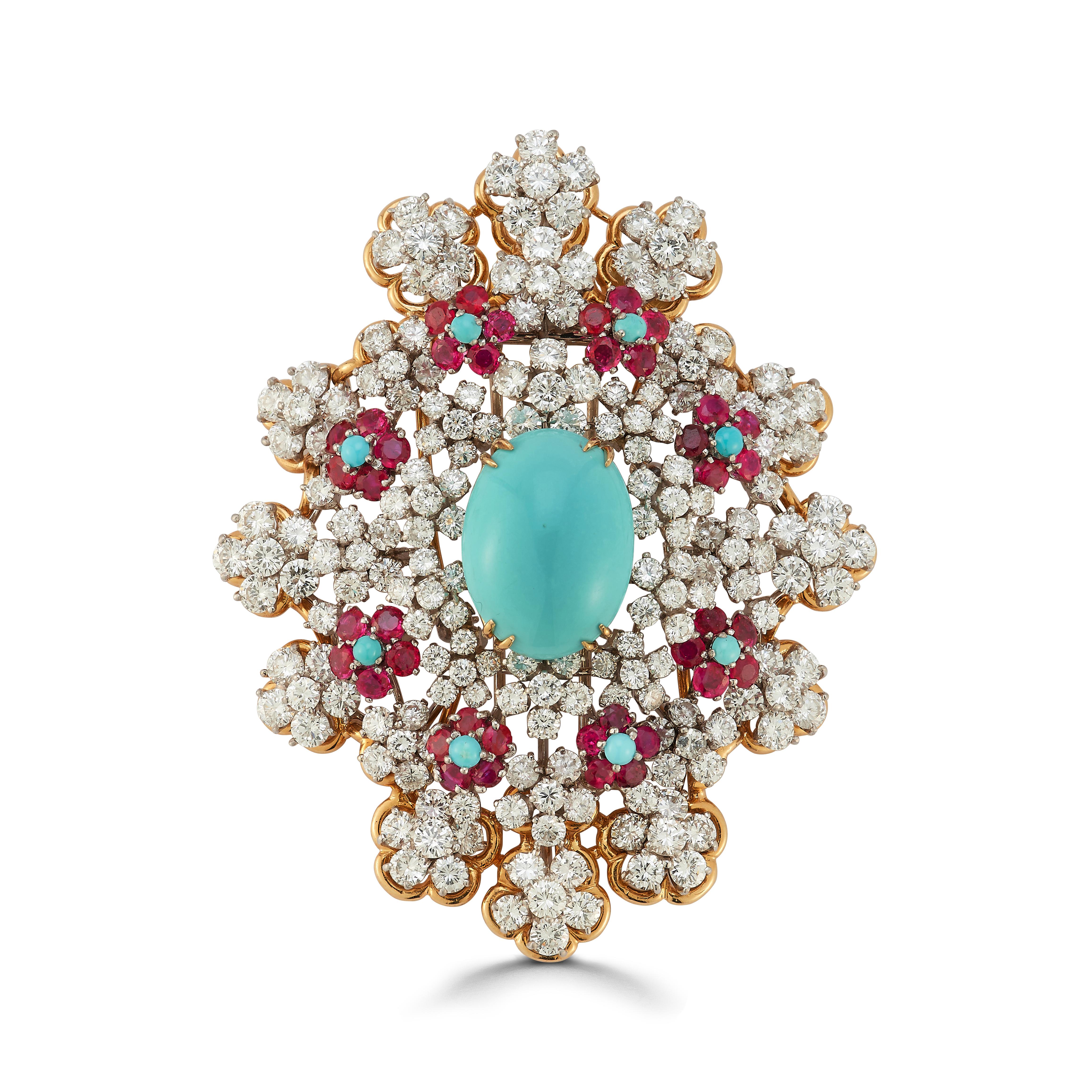 David Webb Turquoise and Ruby Brooch

A platinum and 18 karat gold brooch set with a central cabochon turquoise surrounded by 184 brilliant cut diamonds, 40 brilliant cut rubies, and 8 small cabochon turquoises. The diamonds are set in flower motif