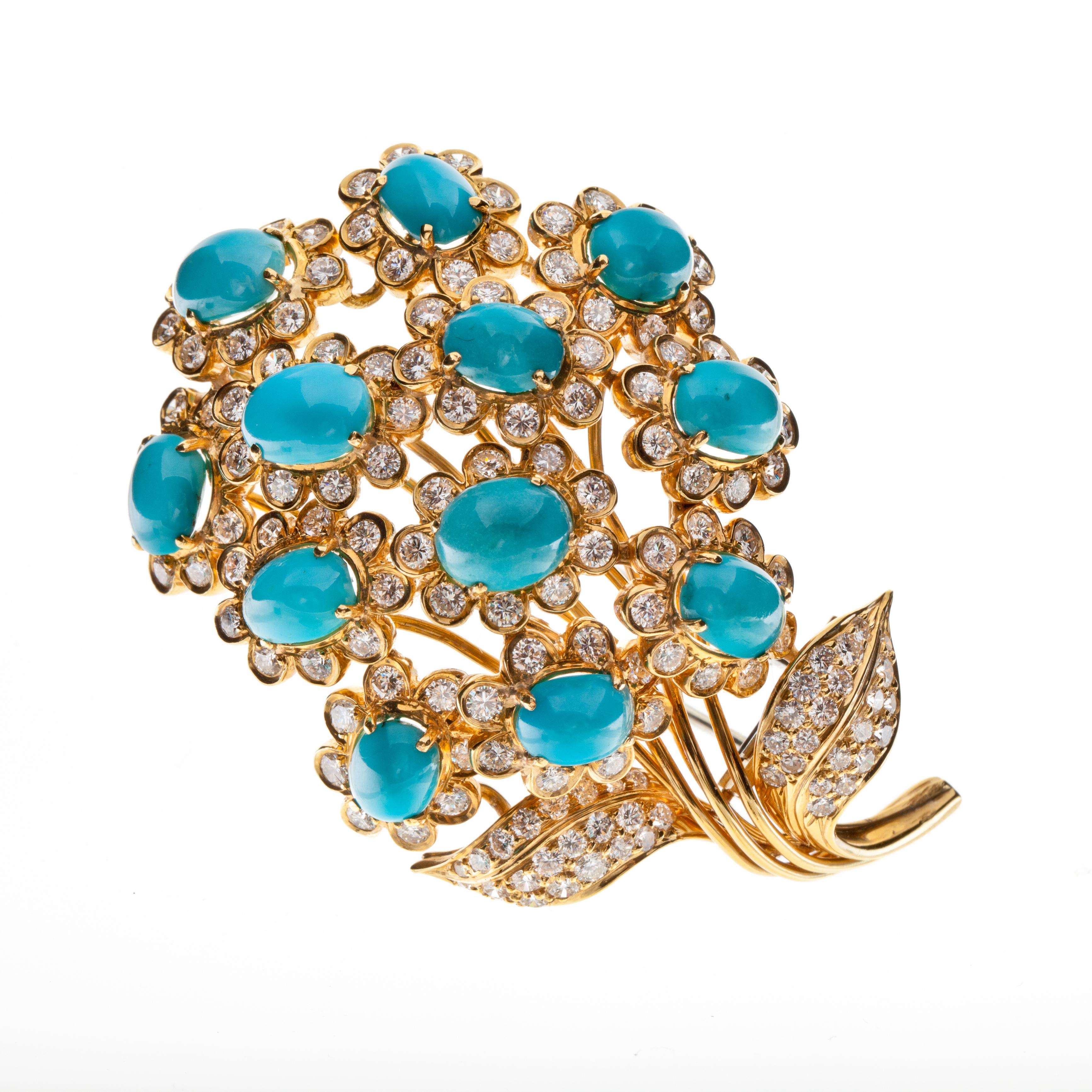 David Webb floral brooch composed of 18K yellow gold featuring turquoise and diamonds.  There is approximately 16 carats of turquoise and 4.80 carats of round brilliant-cut diamonds, E-G color and VVS-VS clarity.