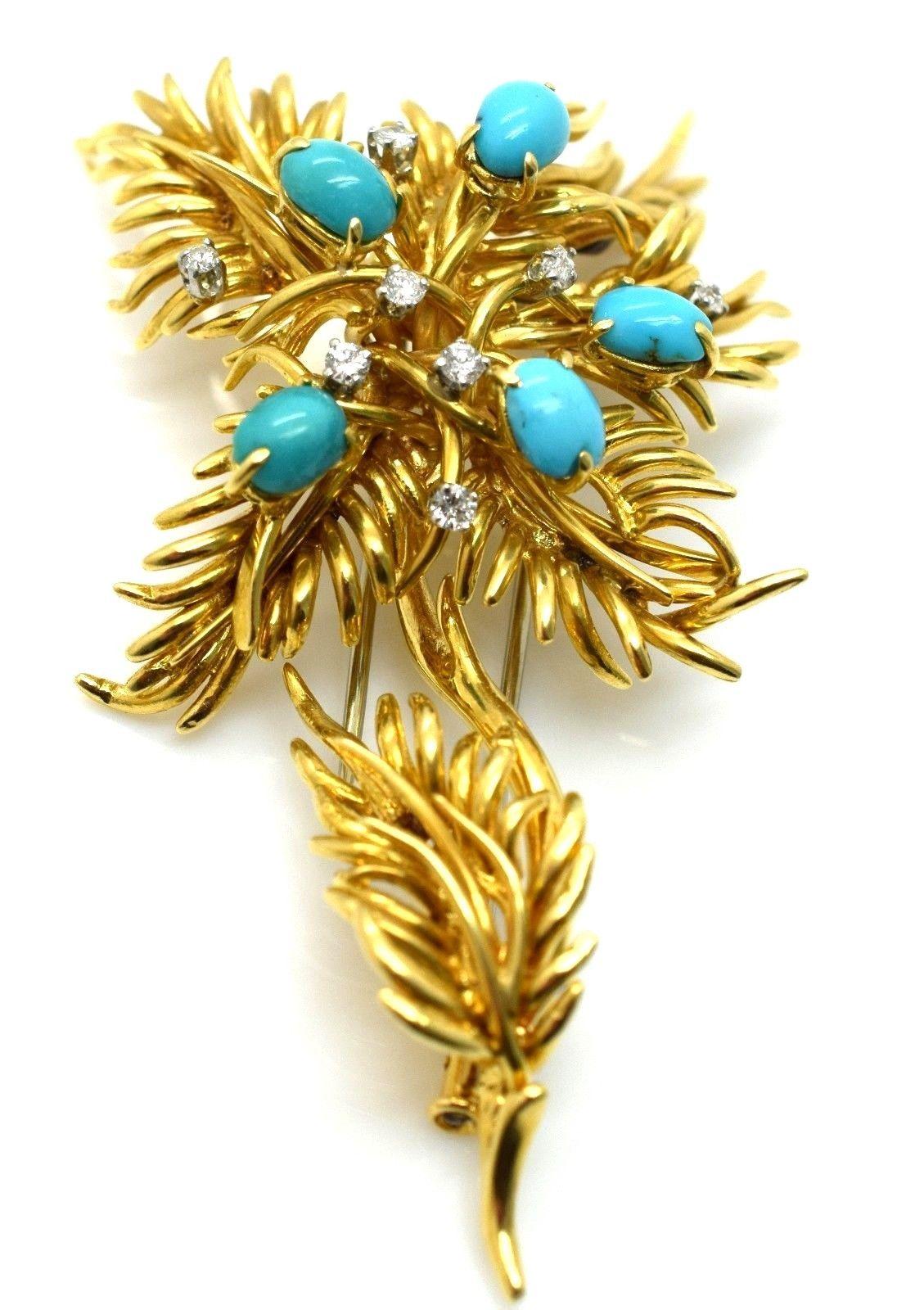     A beautiful brooch from famed designer David Webb. The brooch is set with amazing natural Turquoise cabochons 5 stones in total. Eight Diamonds are set in the piece. The textured design of the flower pattern is a one of a kind design only David