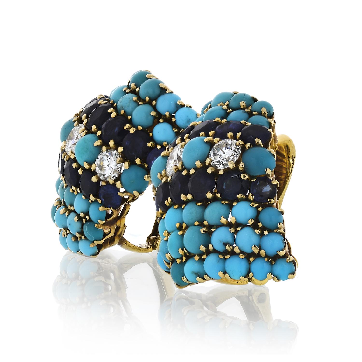 Turquoise, sapphire, and diamond clip-on earrings by David Webb.
WEBB 18K, 14K.
L: 1 inch
W: 0.75 inch