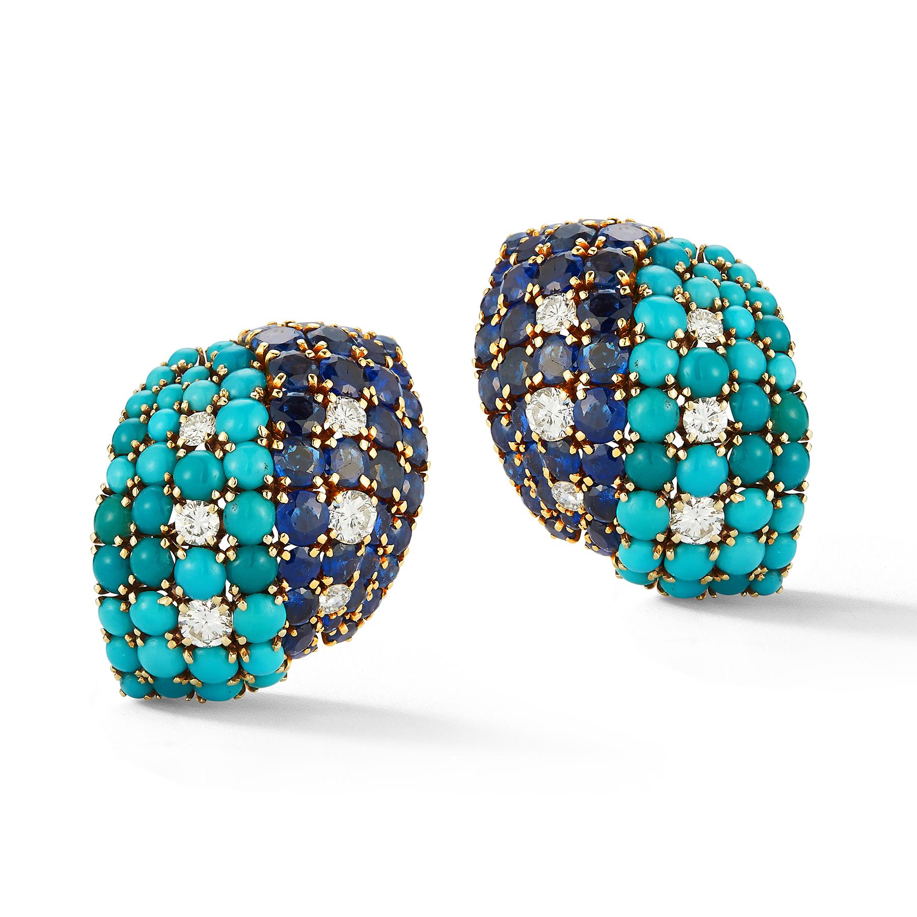 David Webb Turquoise Sapphire & Diamond Earrings 

Set with cabochon turquoise, round cut sapphires & diamonds

Measurements: 1.20