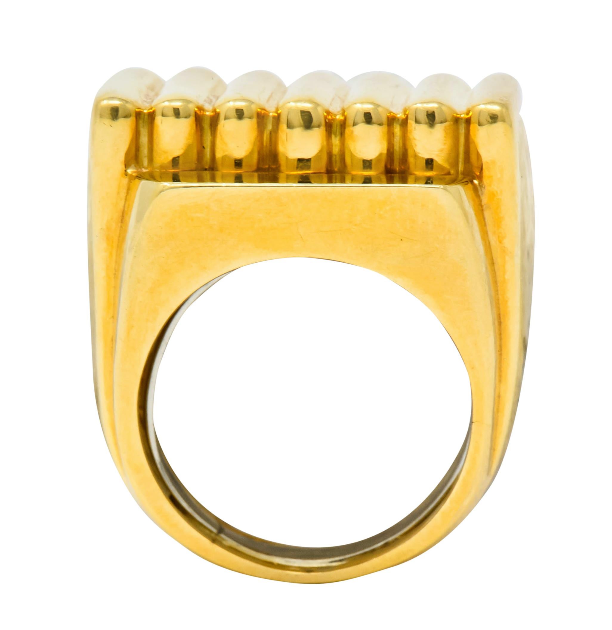 Designed as a deeply ridged formation over a signet style ring

With high polished finish and stylized shoulders

Signed Webb for David Webb and numbered

Stamped 18K for 18 karat gold

Circa 1960's

Ring Size: with sizing bar 6 1/2 & not