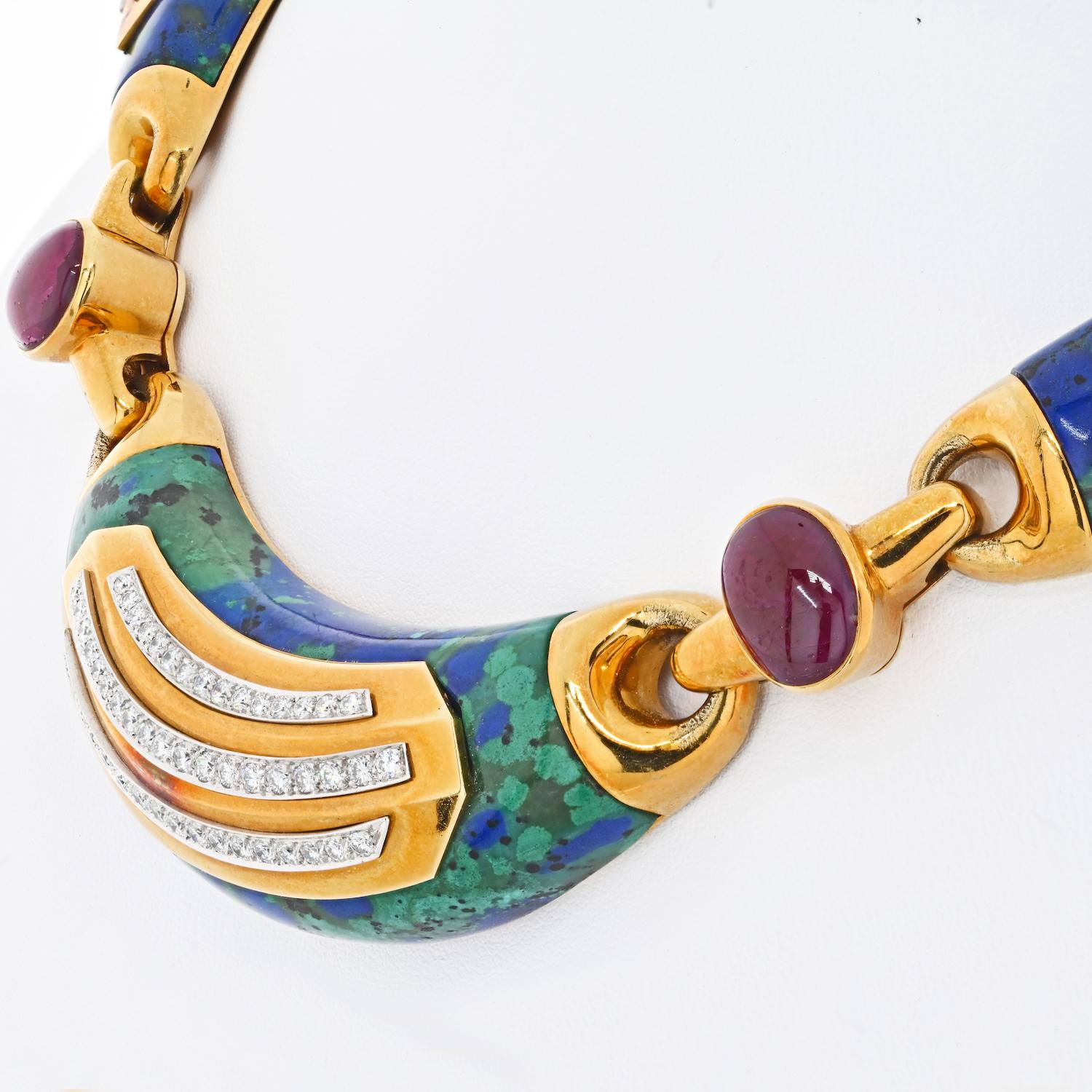 David Webb Vintage 18k Yellow Gold, Platinum, Azurmalachite, Ruby & Diamond Necklace.
The necklace is crafted from carved azurmalachite with 18k yellow gold, platinum, diamond, and ruby inlay. Why pay retail for David Webb when you can buy pre-owned