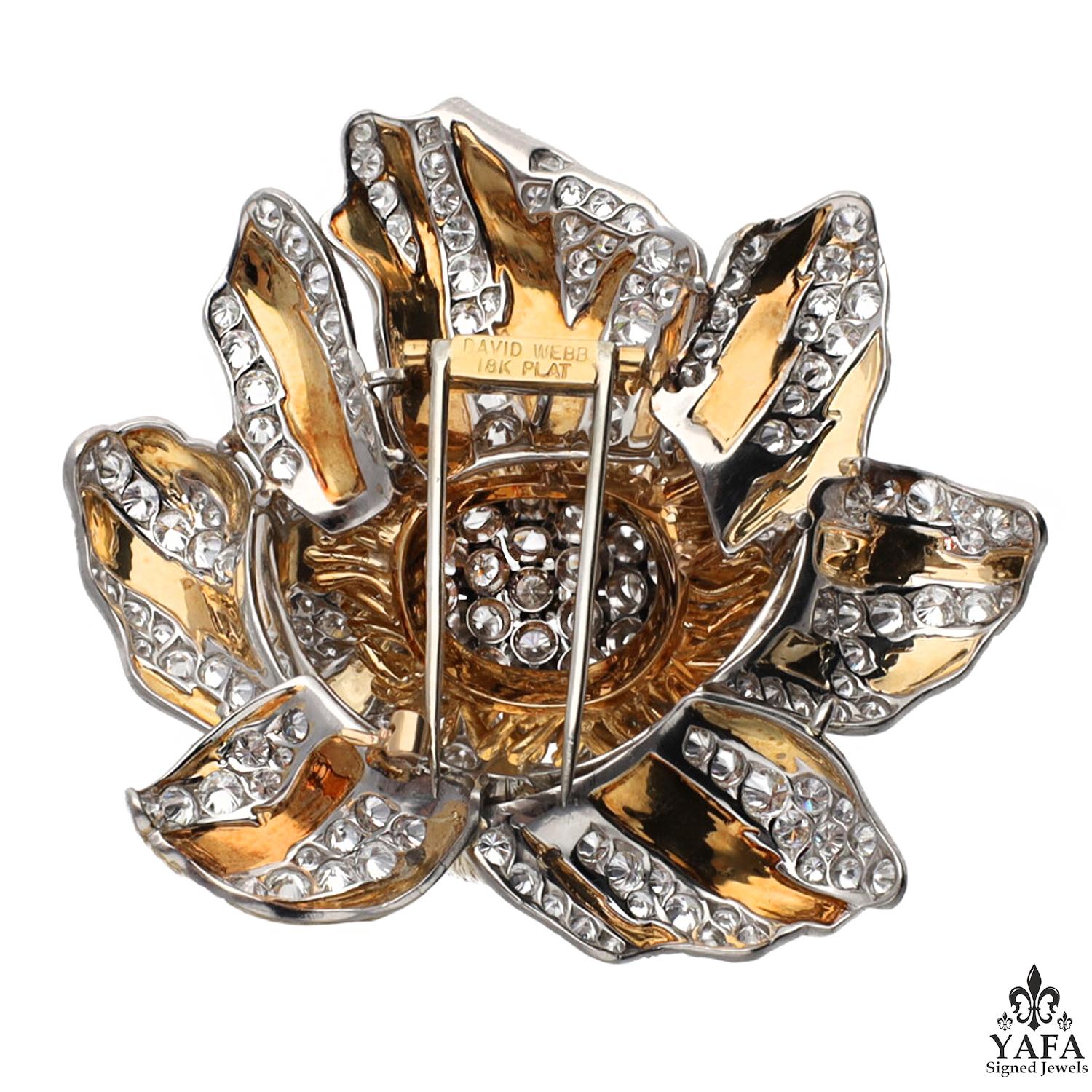 David Webb Vintage Collection Diamond Buttercup Flower Brooch

A mid-century-style brooch by the New York-based high jewelry house of David Webb. The nucleus of the piece features a bombé-shaped pistil covered in diamonds, cascading outwards into