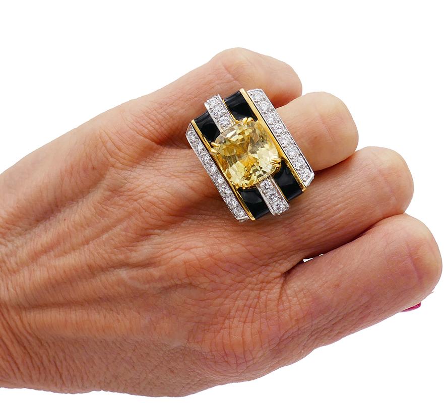 A David Webb vintage ring, made of 18k gold, features yellow sapphire, diamond and enamel.
A David Webb ring at its finest: a stunning, chunky piece that speaks confidence. 
This rectangular shape vintage ring is greatly built of 18 karat yellow