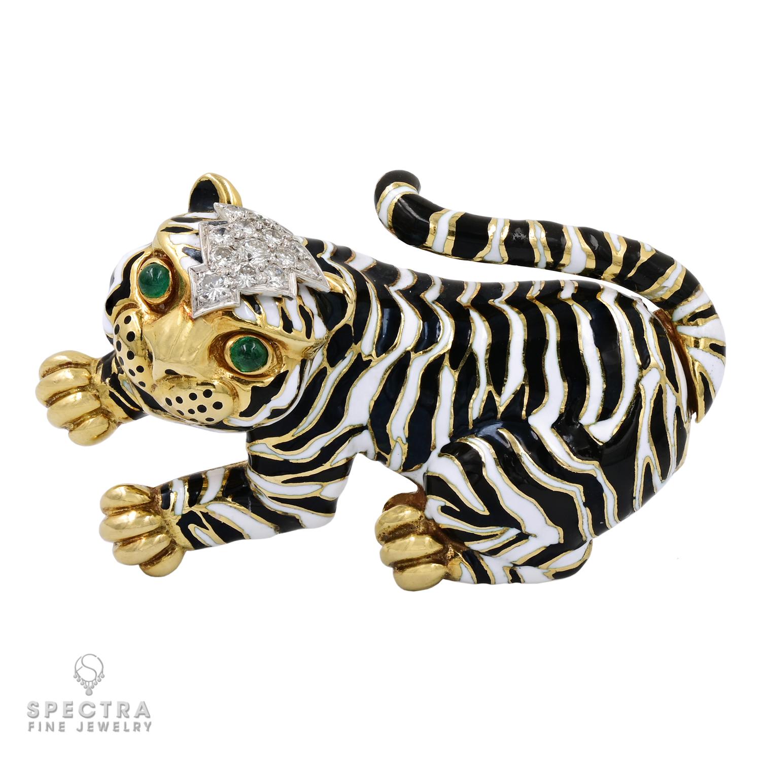 Step into the wild elegance of the 80s with the vintage David Webb Tiger Brooch from the iconic 'Kingdom' collection. This extraordinary piece exudes an air of regal grandeur, capturing the fierce and majestic spirit of the jungle in meticulous