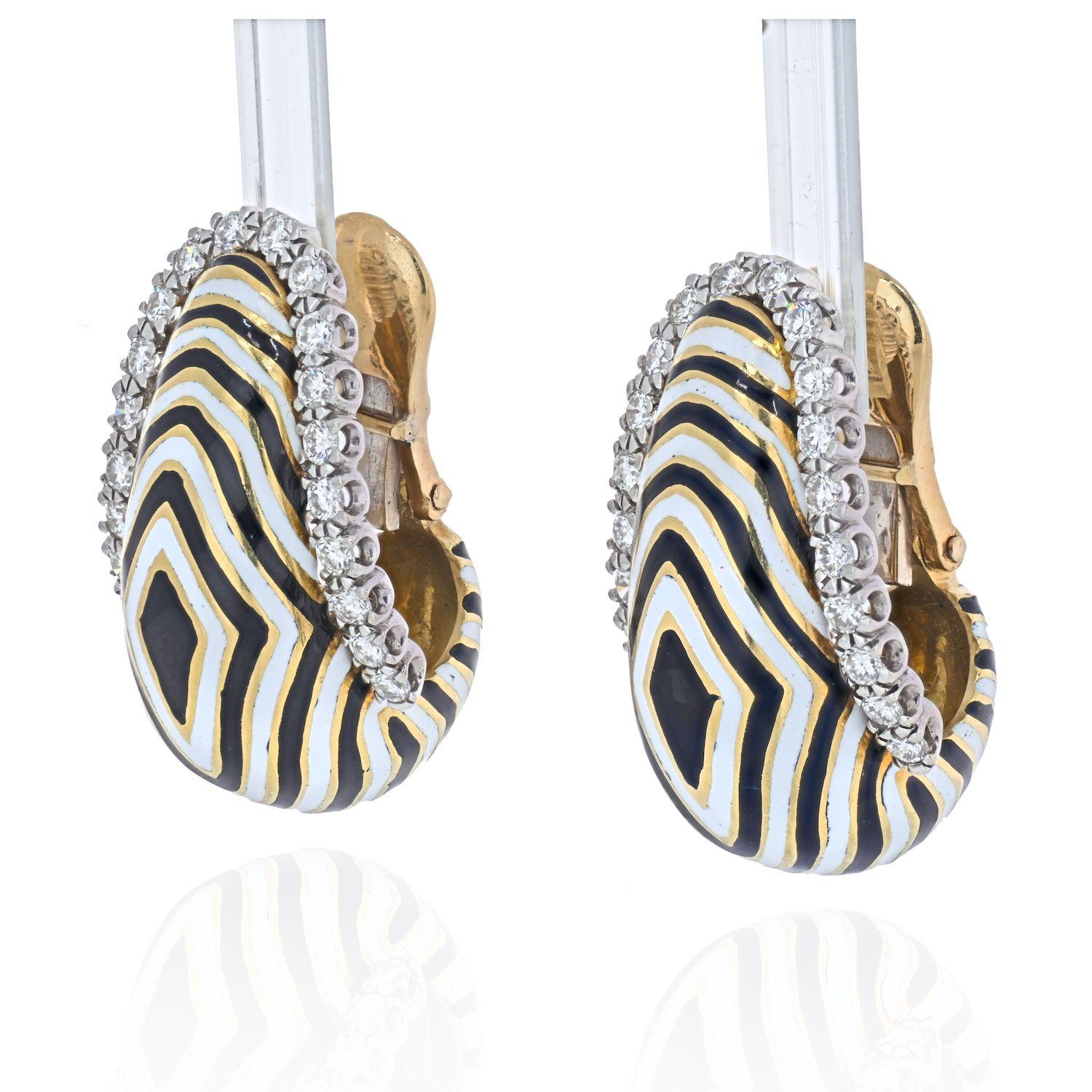 A current model from David Webb collection: Vreeland Zebra Striped Diamond Earrings. Black and white enamel is used to showcase the stunning animal-inspired motif. They're framed by 1.46-carats of brilliant-cut diamonds inlaid in a polished platinum