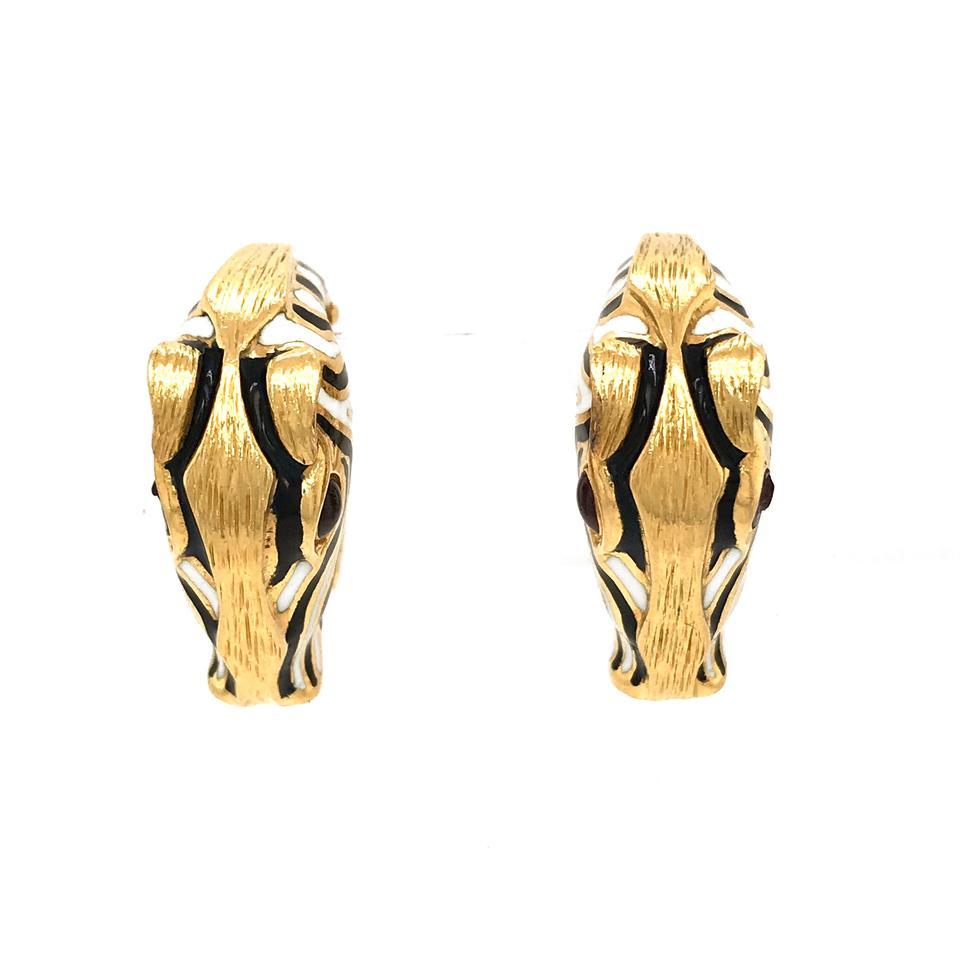 Gold, Black, White and Red Enamel Zebra Dress Set, David Webb 18 kt., including a pair of cufflinks fashioned as zebra heads applied with alternating stripes of white and black enamel, topped with textured gold mane and ears, with red enamel eyes,