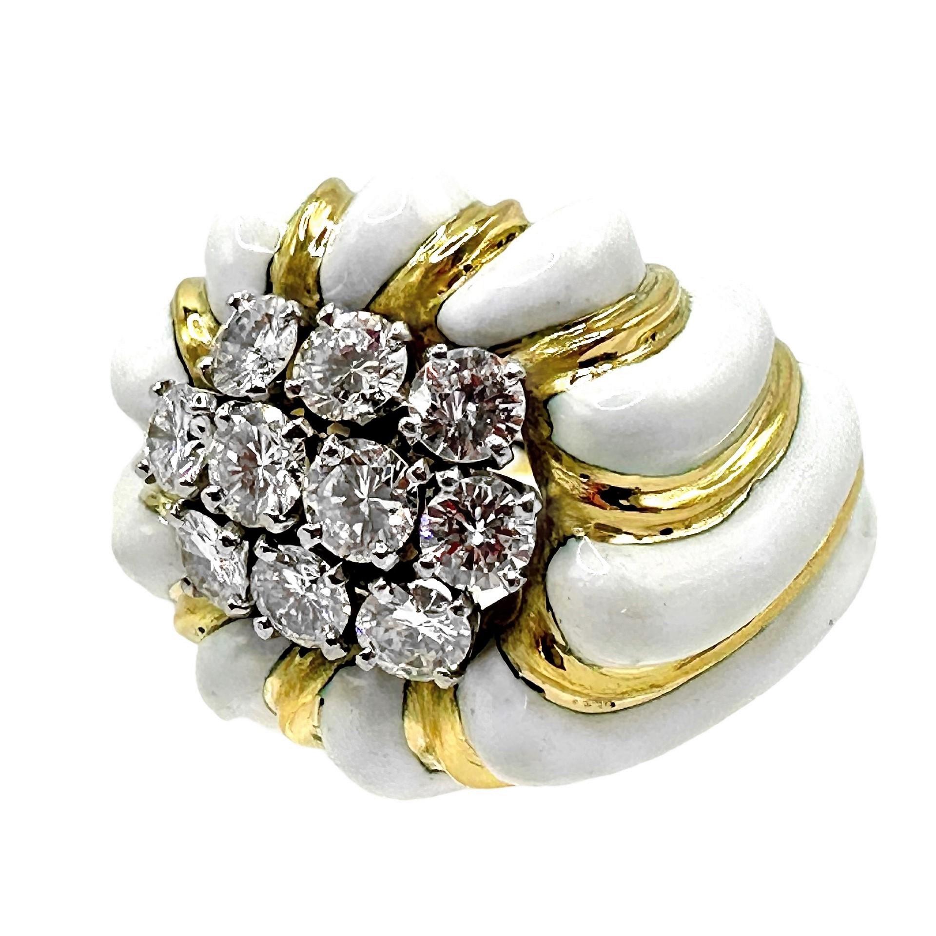 This large and luxurious David Webb creation is characteristic of the designer's work. It measures over 1 full inch across the finger, is 7/8 inches in the other direction, and rises 5/8 inches above the finger when worn. At the center is a cluster