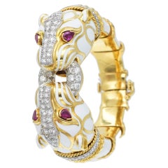 Bracelet David Webb à double tête de panthère, en émail blanc, diamants et rubis.