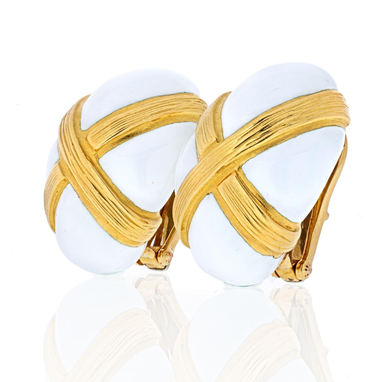 18K Yellow Gold earrings with four sections of white enamel with a textured gold X across it. Designer: David Webb. 
Circa 1960's.  Length: 1 in.; Width: 3/4 in.
