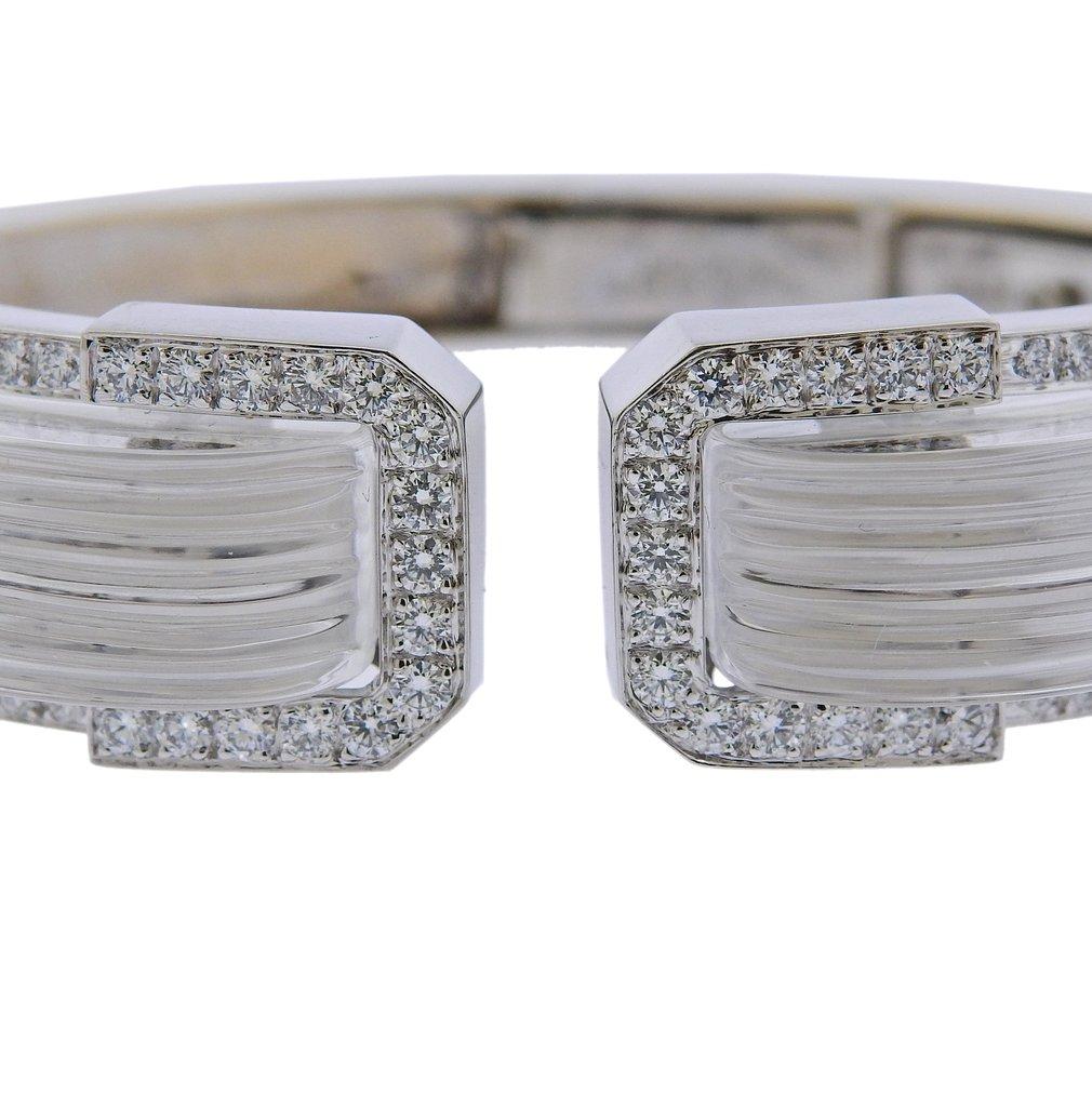 18k gold and platinum cuff bracelet from White Knight collection, crafted by David We,, set with carved crystal and approx. 2.20ctw in H/VS-SI1 diamonds. Retail $36000. Bracelet will fit approx. 7