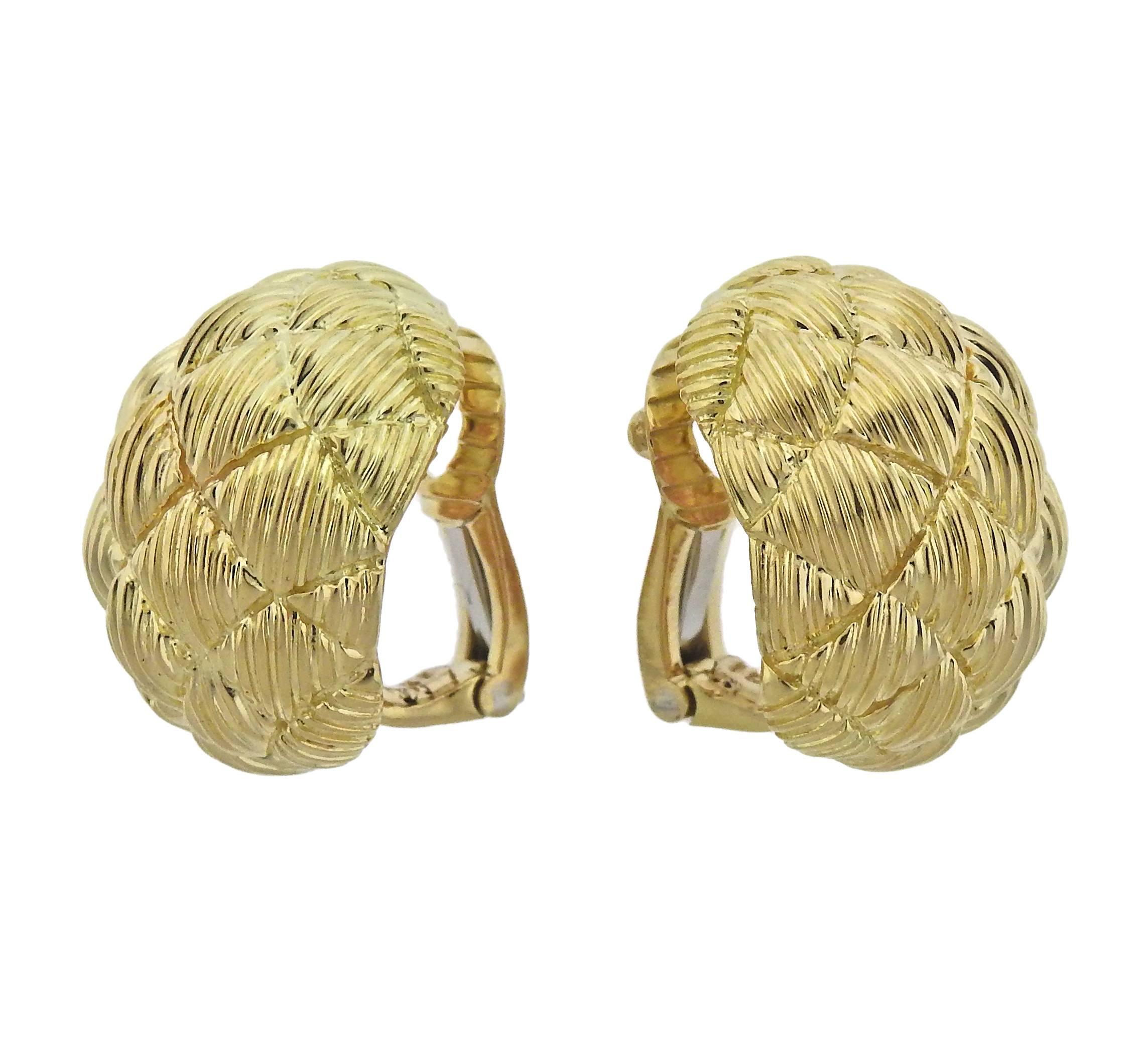  Pair of 18k yellow gold half hoop woven earrings, crafted by David Webb. Earrings are 21mm x 17mm, weigh 26.5 grams. Marked: Webb 18k.