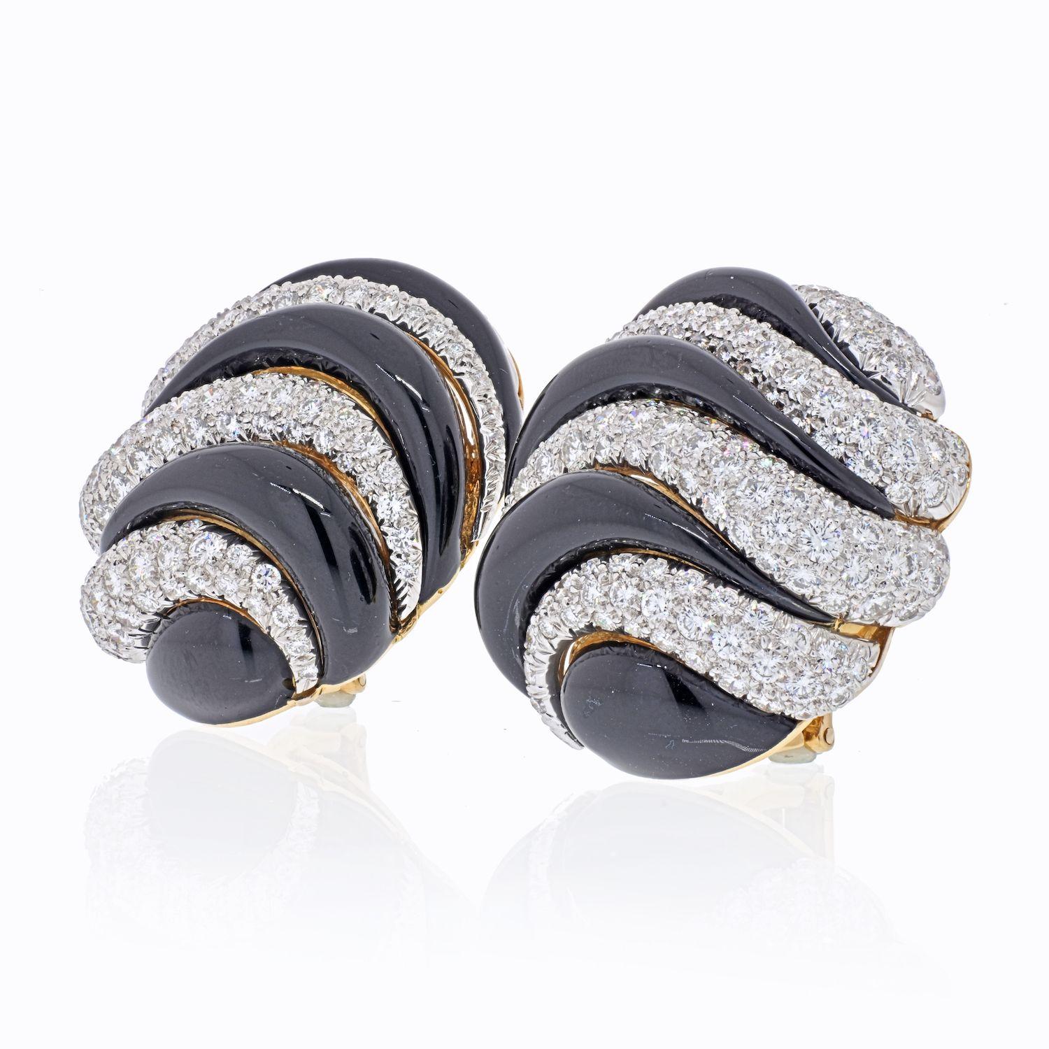 Absolutely stunning David Webb earrings crafted in 18K Yellow Gold and platinum. Impressive size and high gloss enamel along with diamond encrusted curved lines in between. 
Diamond carat weight: 9.80cttw
Quality: F-G color VVS-VS clarity 
Clip On