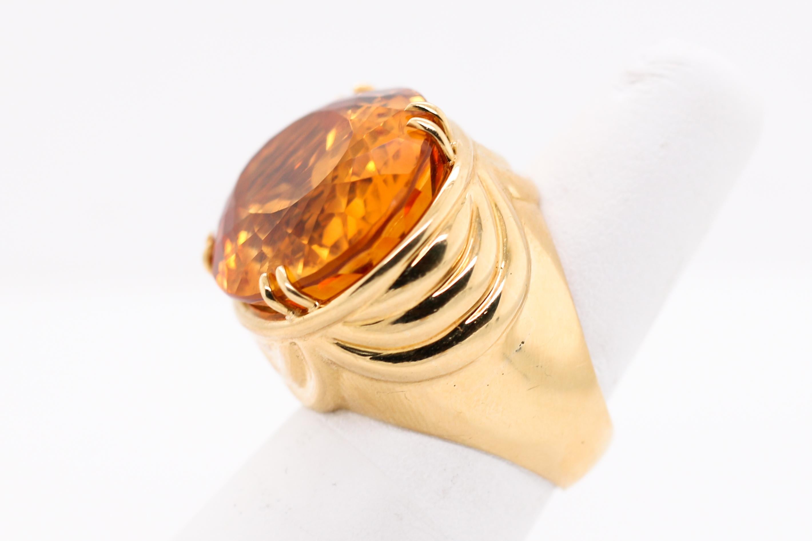 Stunning yellow gold and Citrine David Webb Ring.  A real statement piece!  Faceted Oval Citrine Ring.  Approximately 36 carat stone and ring is a size 6.  