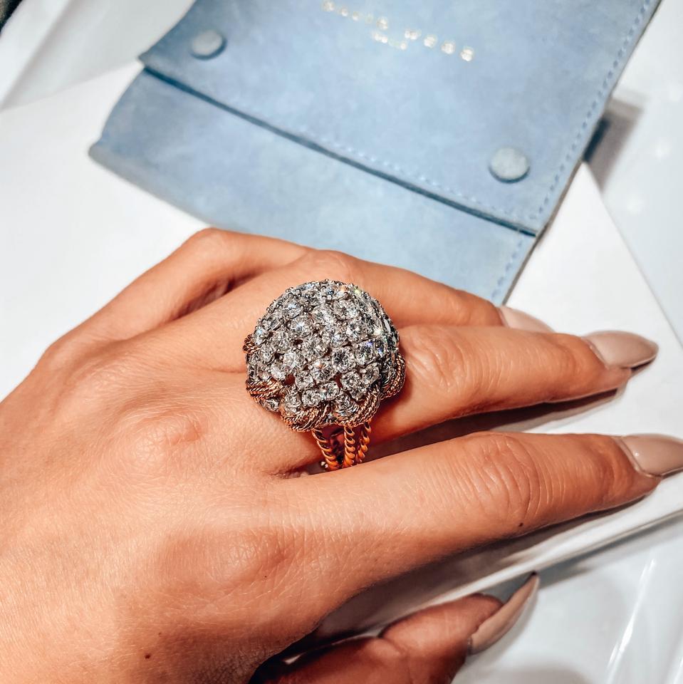 Indulge in the timeless elegance of the David Webb Diamond Bombe Ring, a stunning piece from the esteemed jewelry designer's current collection in New York. This ring, crafted with precision and adorned with high-quality diamonds, is a symbol of