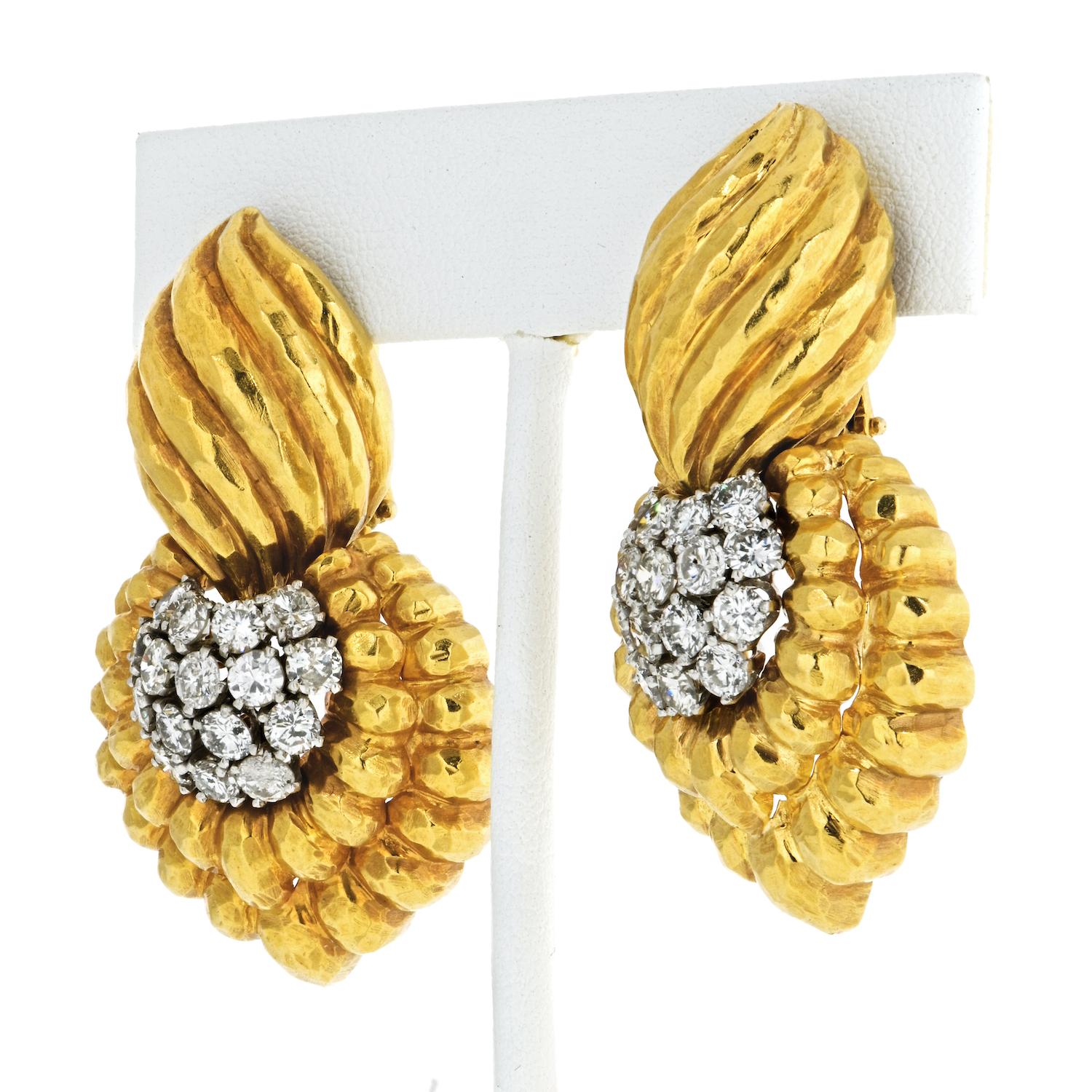 Brilliant-cut diamonds, hammered 18K gold, and platinum

Substantial door knocker earrings by David Webb is the ultimate luxury in your jewelry box. Loud statement on your ears, with texture and vintage grace you will be the star of the show. 

The