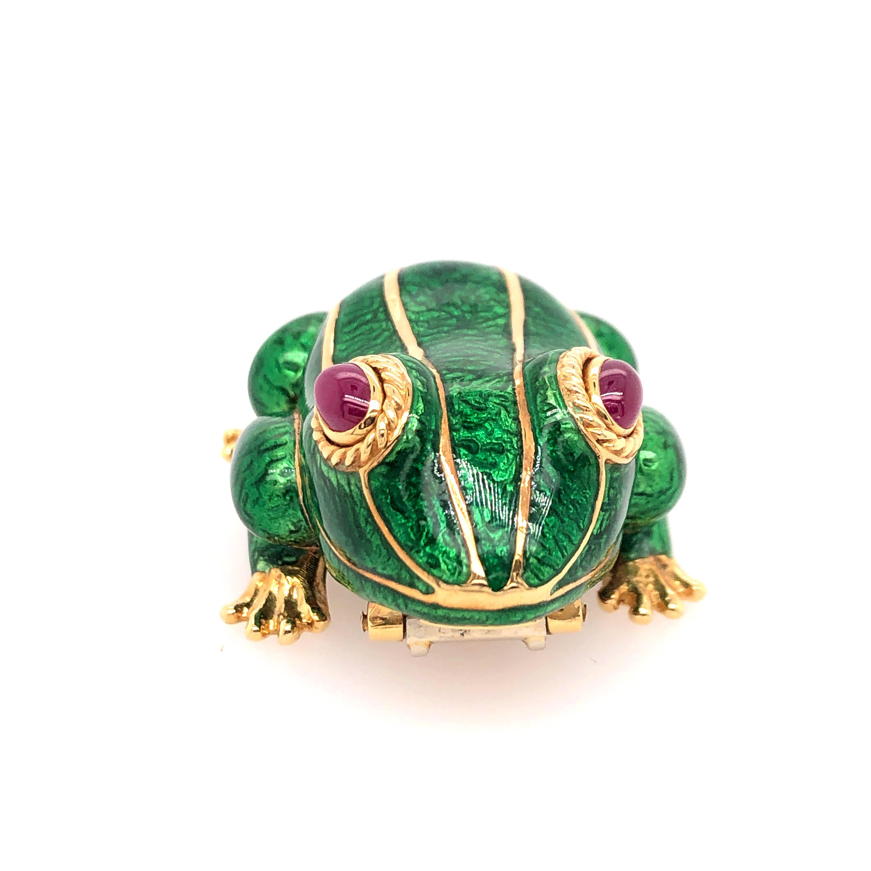 Just AWESOME!!! That is all we can say... AWESOME. 
David Webb's 18K yellow gold green enamel frog with cabochon ruby eyes is the proverbial 