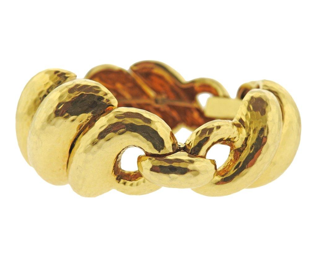 David Webb large link bracelet in 18k yellow hammered gold. Bracelet is 6.75