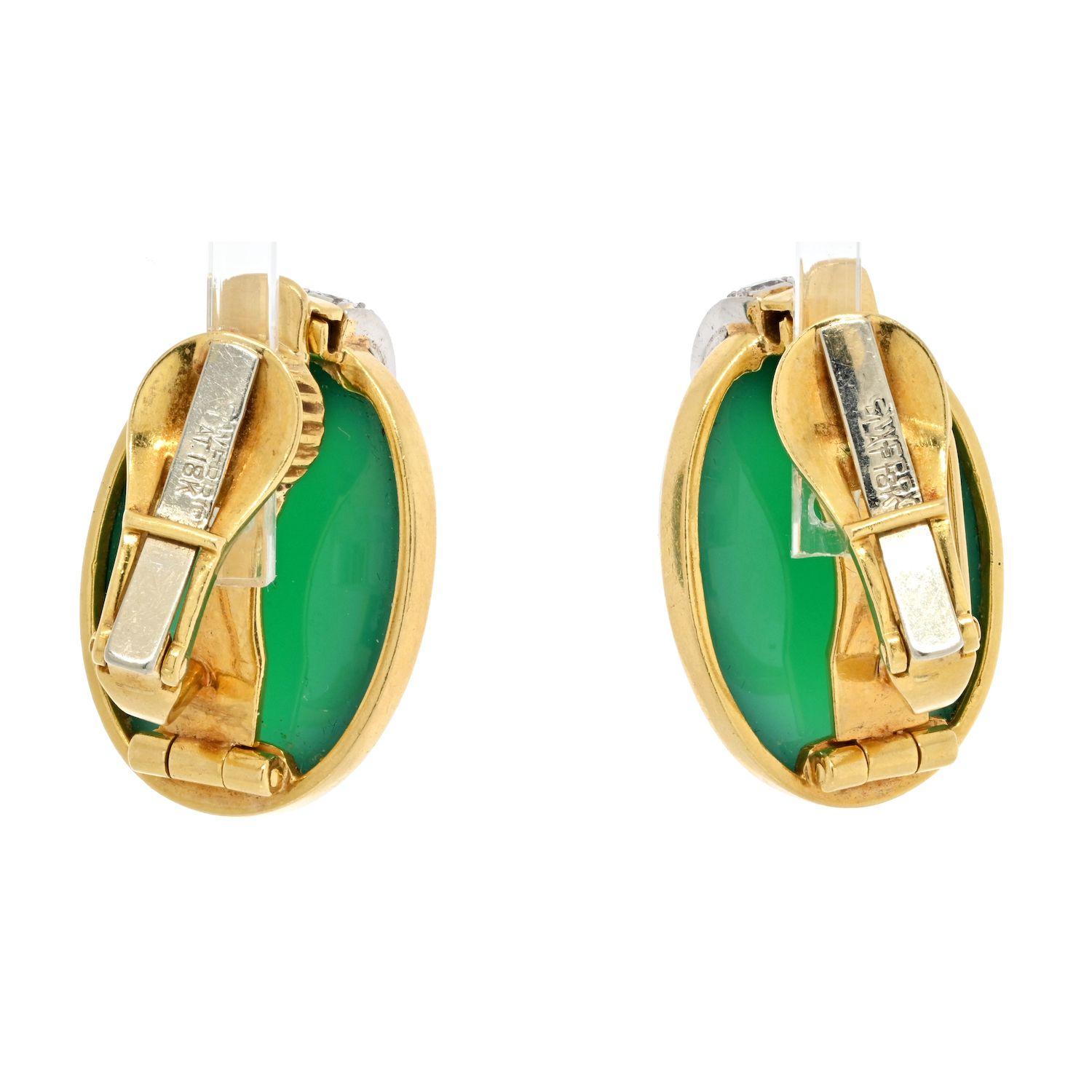 Lovely and easy to wear this pair of David Webb 18K Yellow Gold Oval Cabochon Green Chrysophase And Diamond Clip Earrings is a perfect choice for the Holidays. 
Impressive like every David Webb pair of earrings but not overwhelming. 
You will love