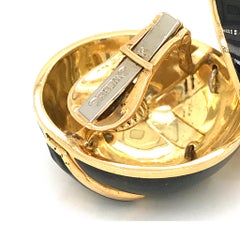 David Webb Orecchini a clip tondi in oro giallo con smalto nero