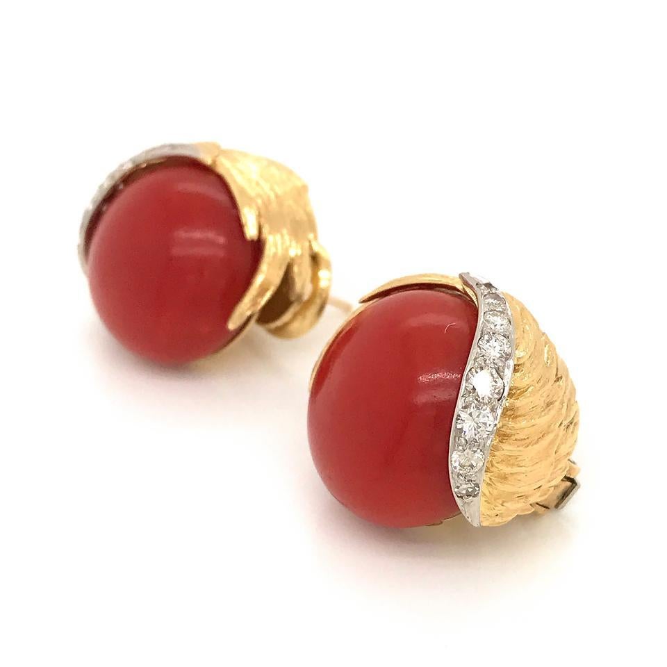 Beautiful David Webb 18k yellow gold and platinum pierced clip on earrings made with coral and diamonds.
Excellent pre-owned condition.
Earring width: 18.5mm
Comes with David Webb vintage box.