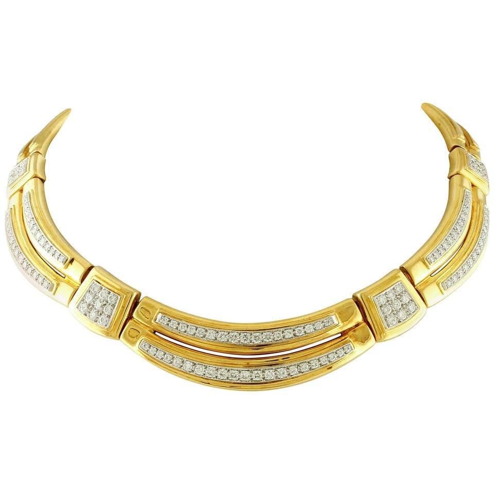 Rare yellow gold David Webb collar necklace set with round brilliant cut diamonds in a micro prong setting.

Metal: 18K Yellow Gold
Stamp: 18K, PLAT, WEBB
Weight: 145.3 Grams
Measures: 16 inches long 5/8 of an inch in width
Diamonds: 15.00 cttw