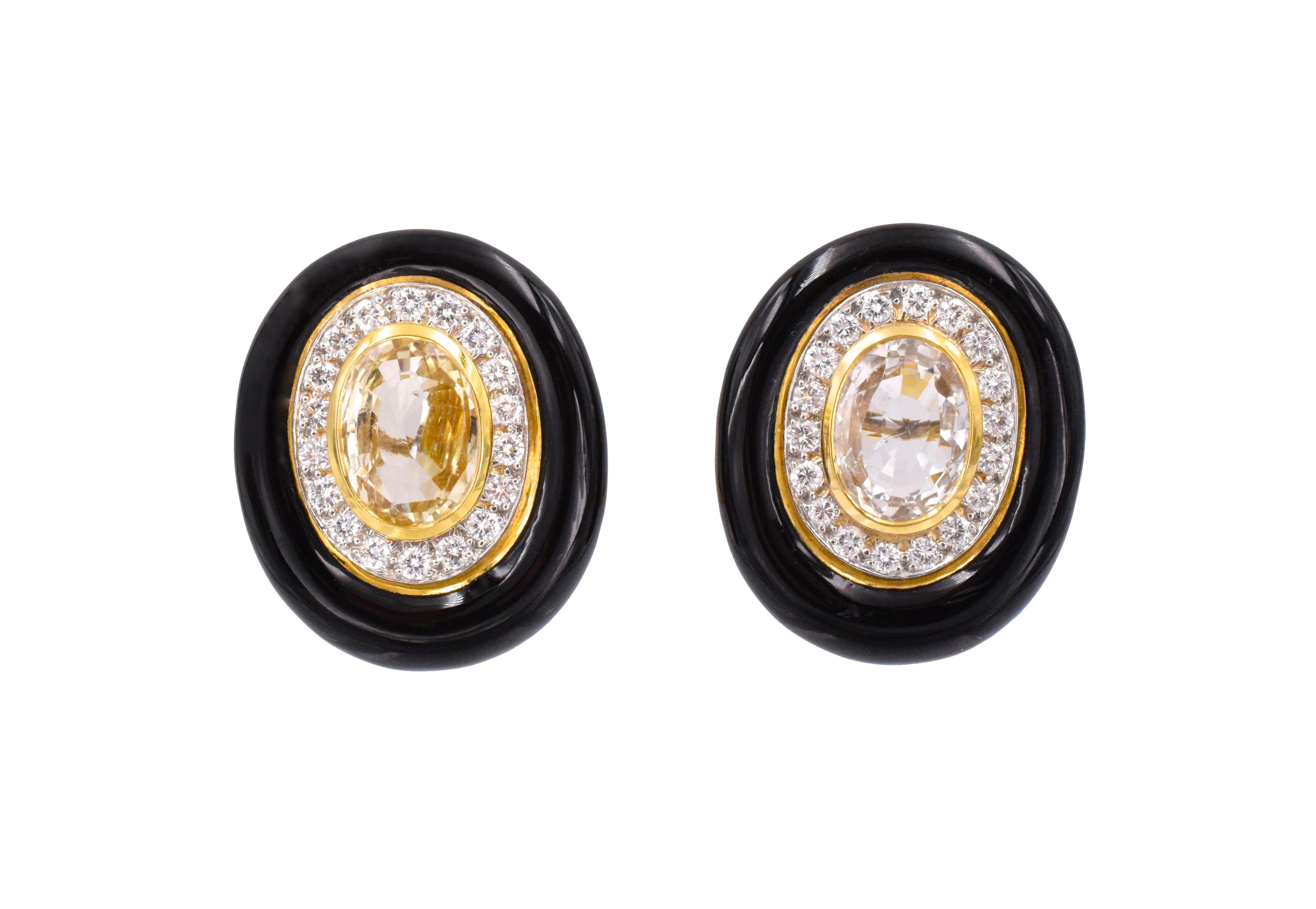 David Webb Ear Clips
Oval shape yellow sapphire embezled by black enamel & surrounded by brilliant shape diamonds set in 18k yellow gold
Signed: David Webb