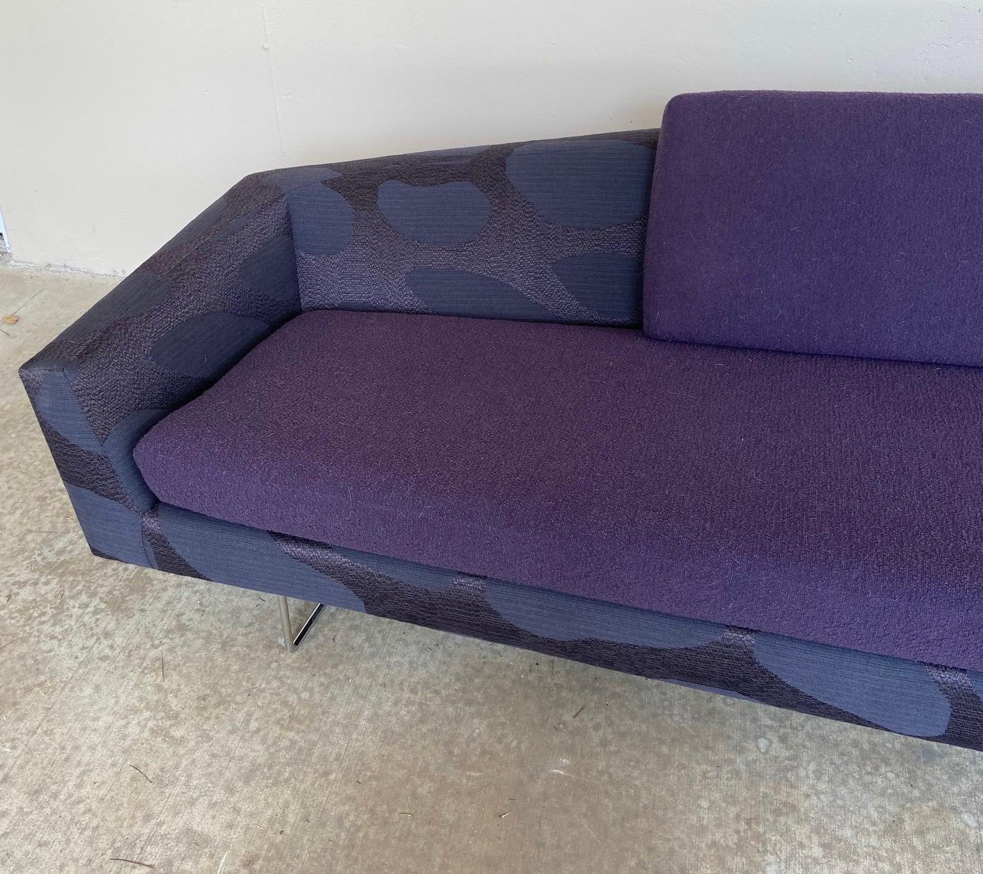 A unique sofa design by David weeks circa 2014… Excellent condition ..beautiful upholstery on a stainless steel base.