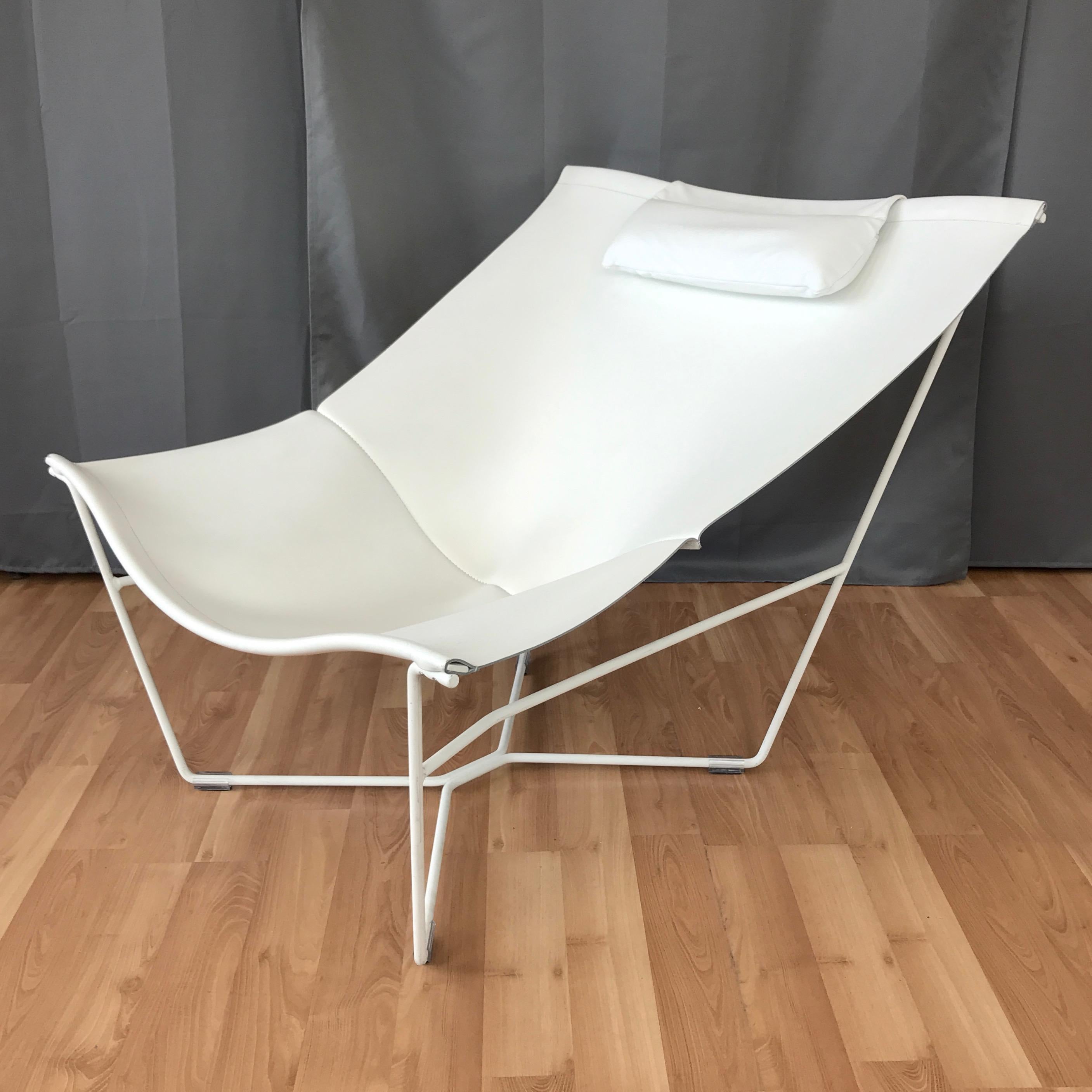 A white leather and steel Semana Chair No. 501 by David Weeks for Habitat UK.

A more comfortable modernist take on the classic butterfly chair, its expansive low-slung seat of bright white tailored leather is accented by a detached
