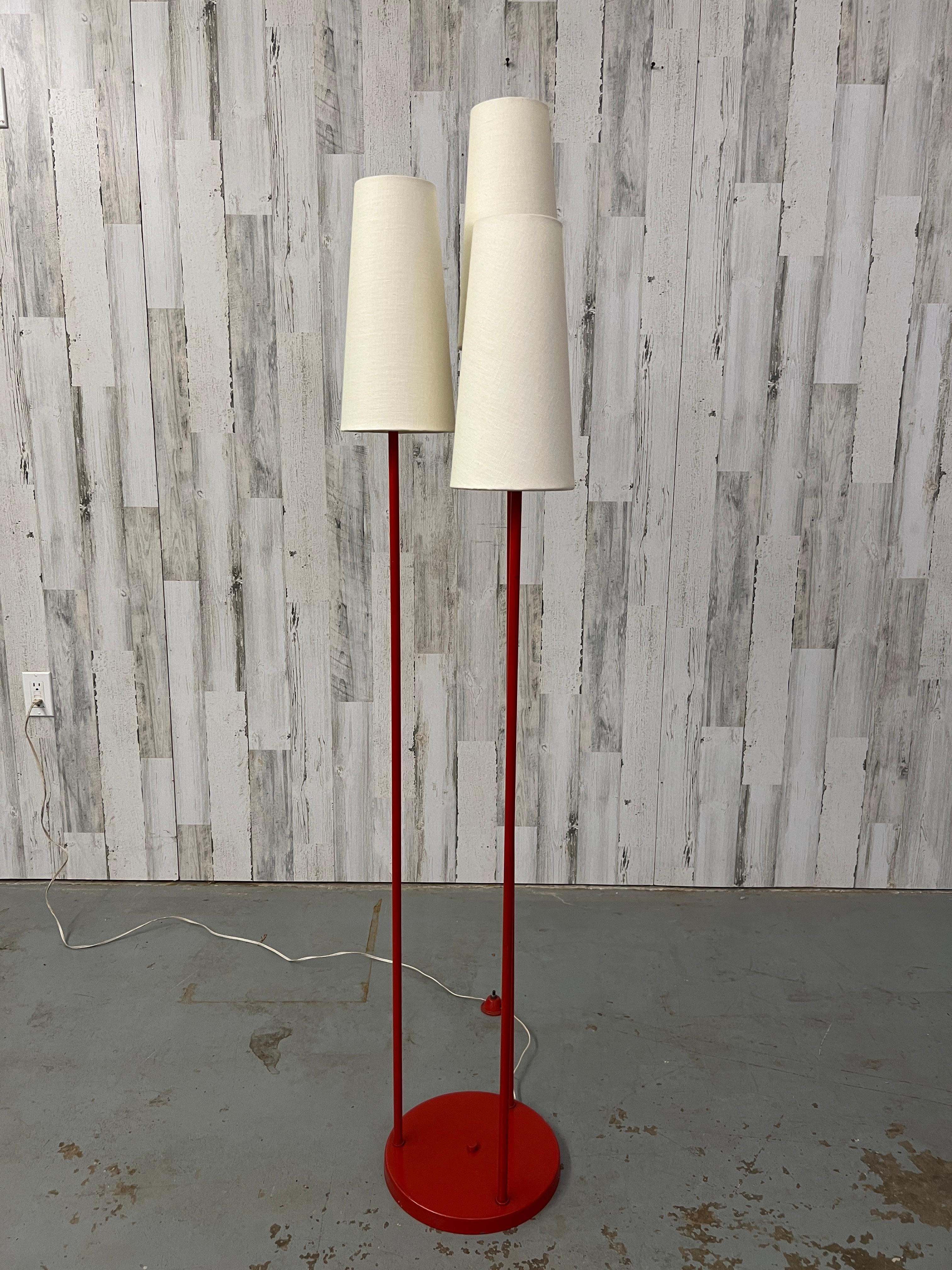 Very rare in the red color 1950s triple shade floor lamp designed by David Wurster for Raymor. The shades are new linen.