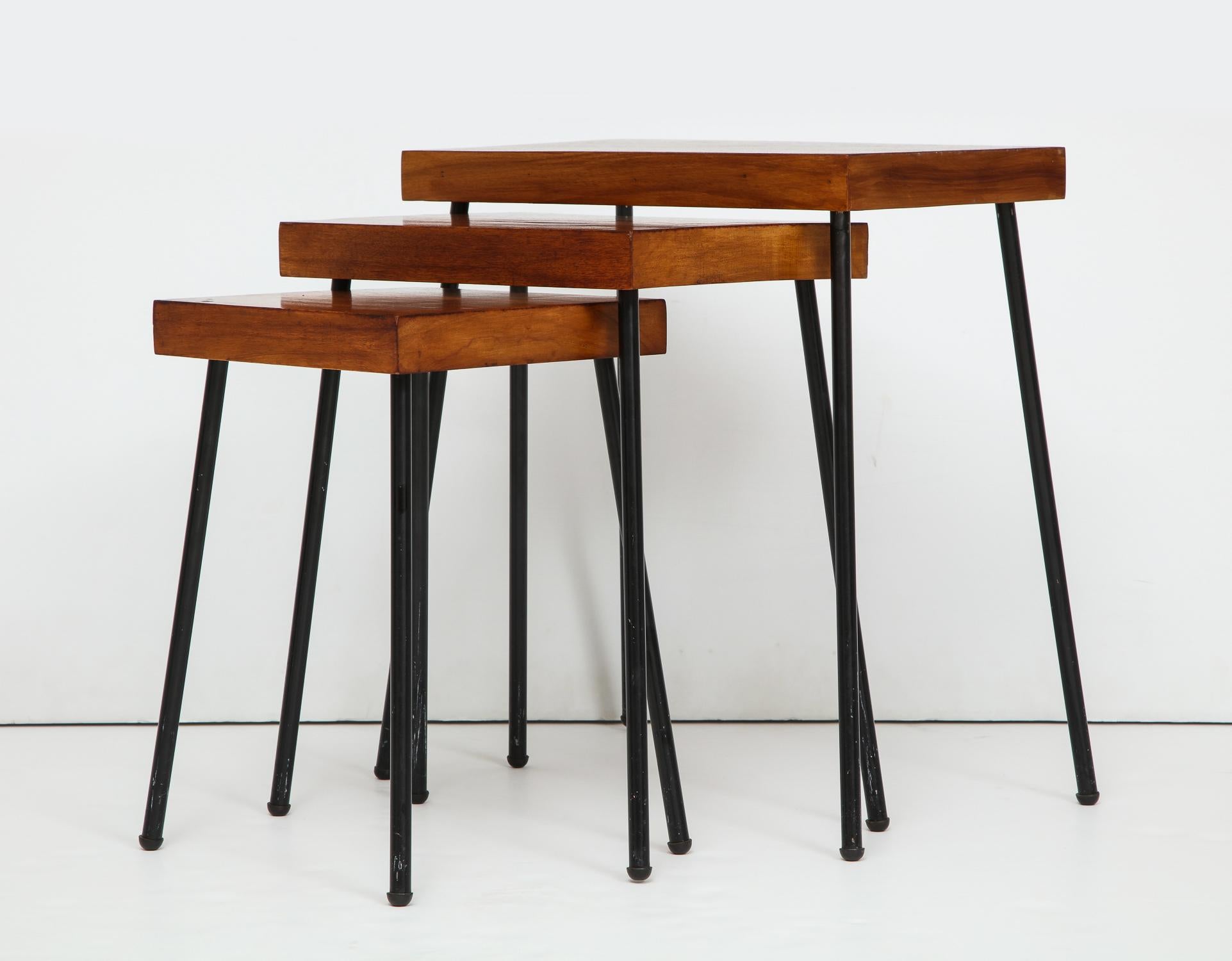 Nest of three tables with birch tops and blackened tubular steel legs. Designed by David Wurster and produced for Richards-Morgentau (Raymor) circa 1952. Wurster's lighting was a regular Good Design selection at MoMA in the early 1950's, and this