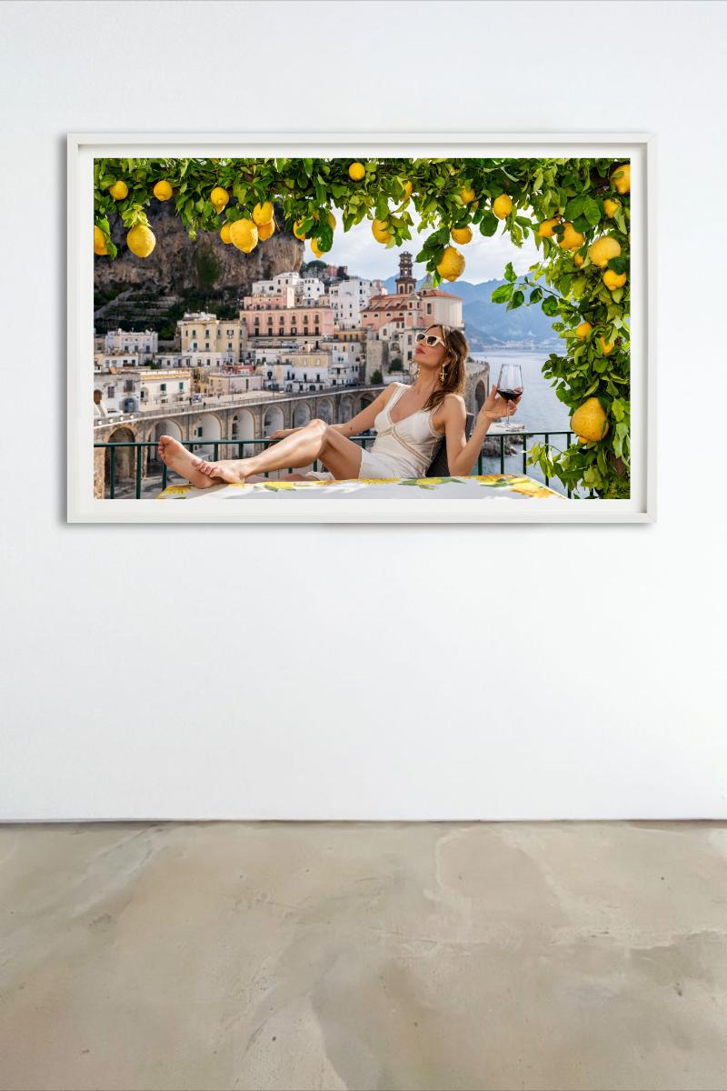 A Room With A View - Woman Drinking Wine, Lemontree, Fine Art Photography, 2025 - Brown Color Photograph by David Yarrow